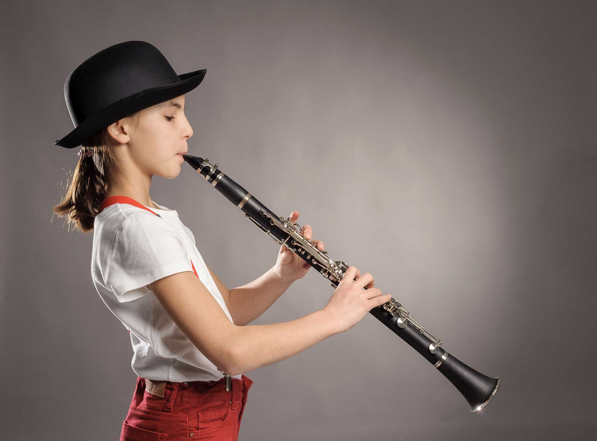 girl playing a clarinet