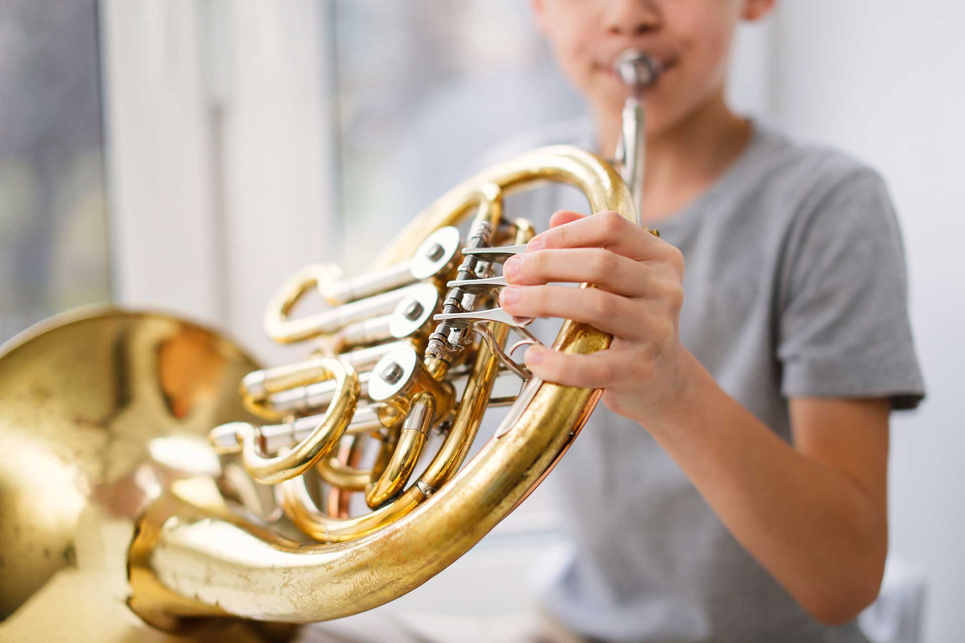 boy playing a trombone