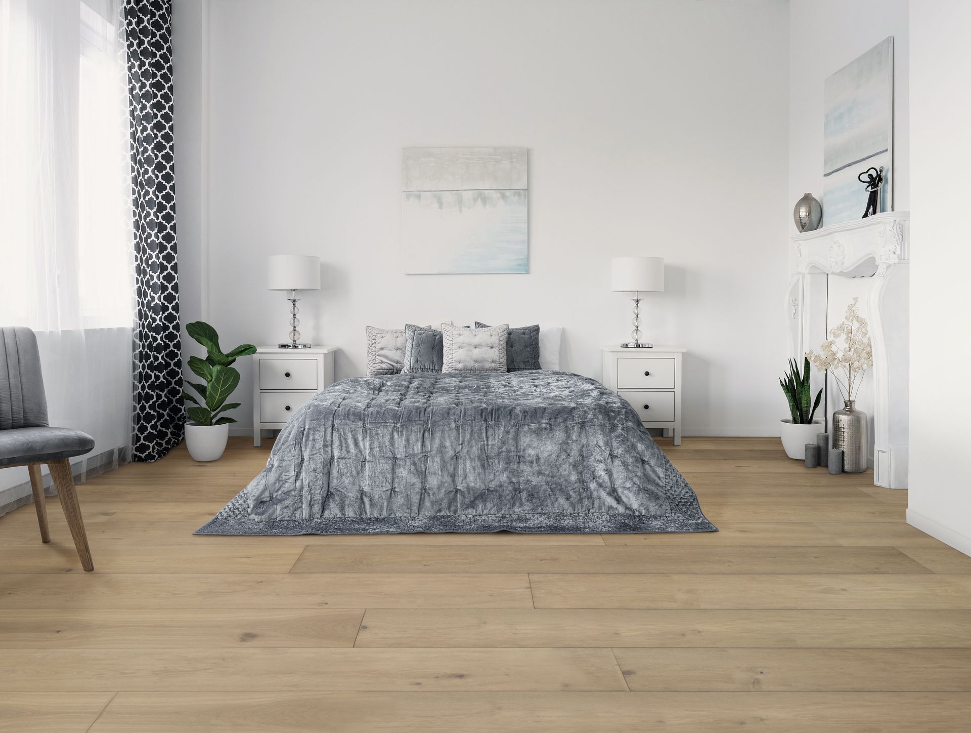 There is a large bed in the middle of the room.