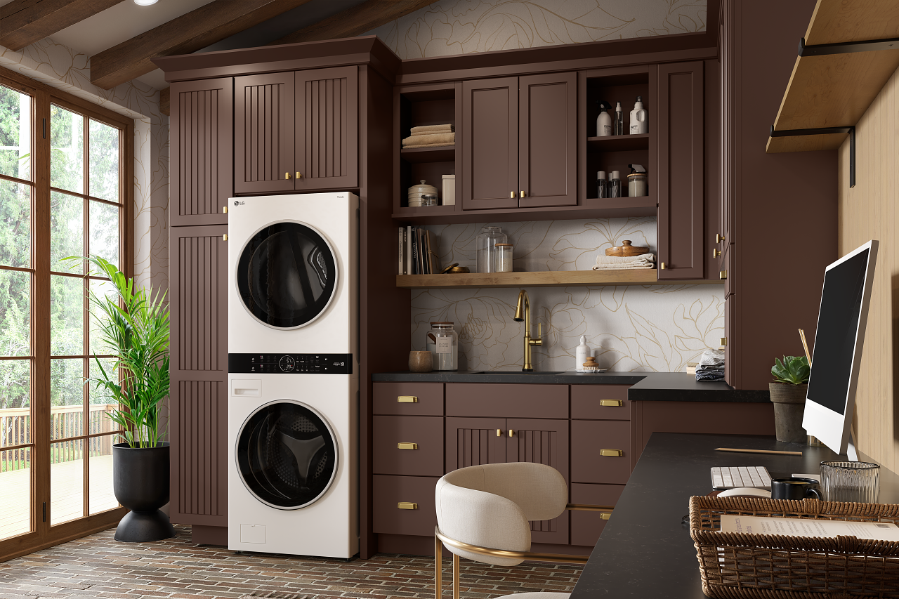 A laundry room with a washer and dryer stacked on top of each other.