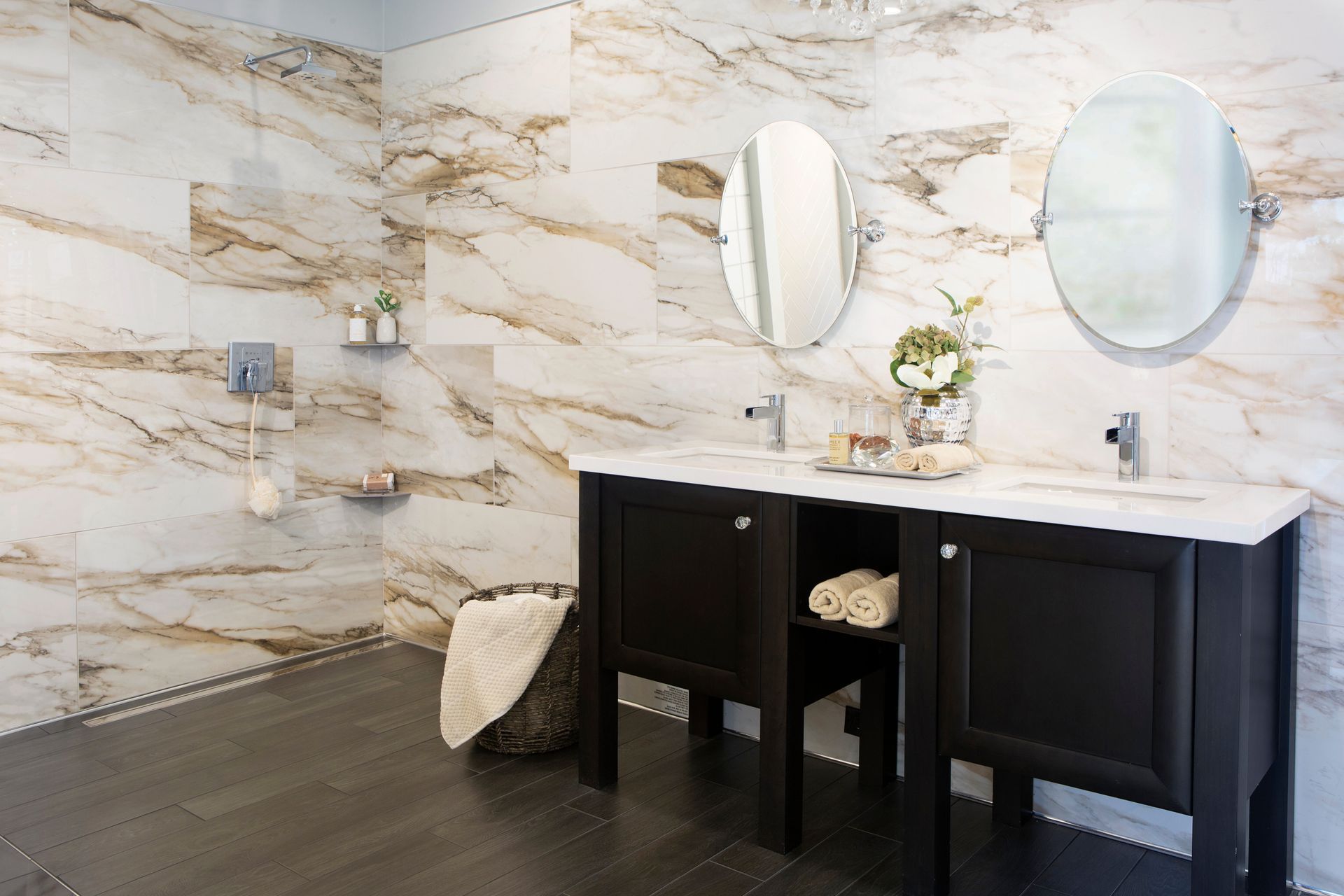 A bathroom with two sinks and two mirrors.