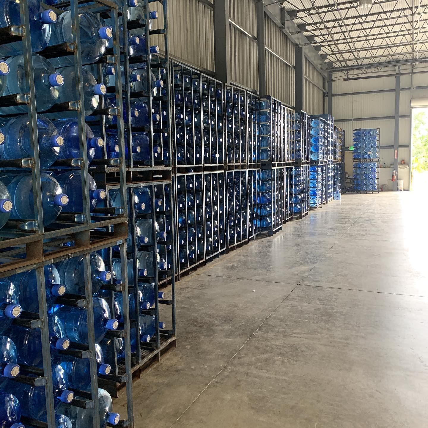 A warehouse filled with lots of water bottles.