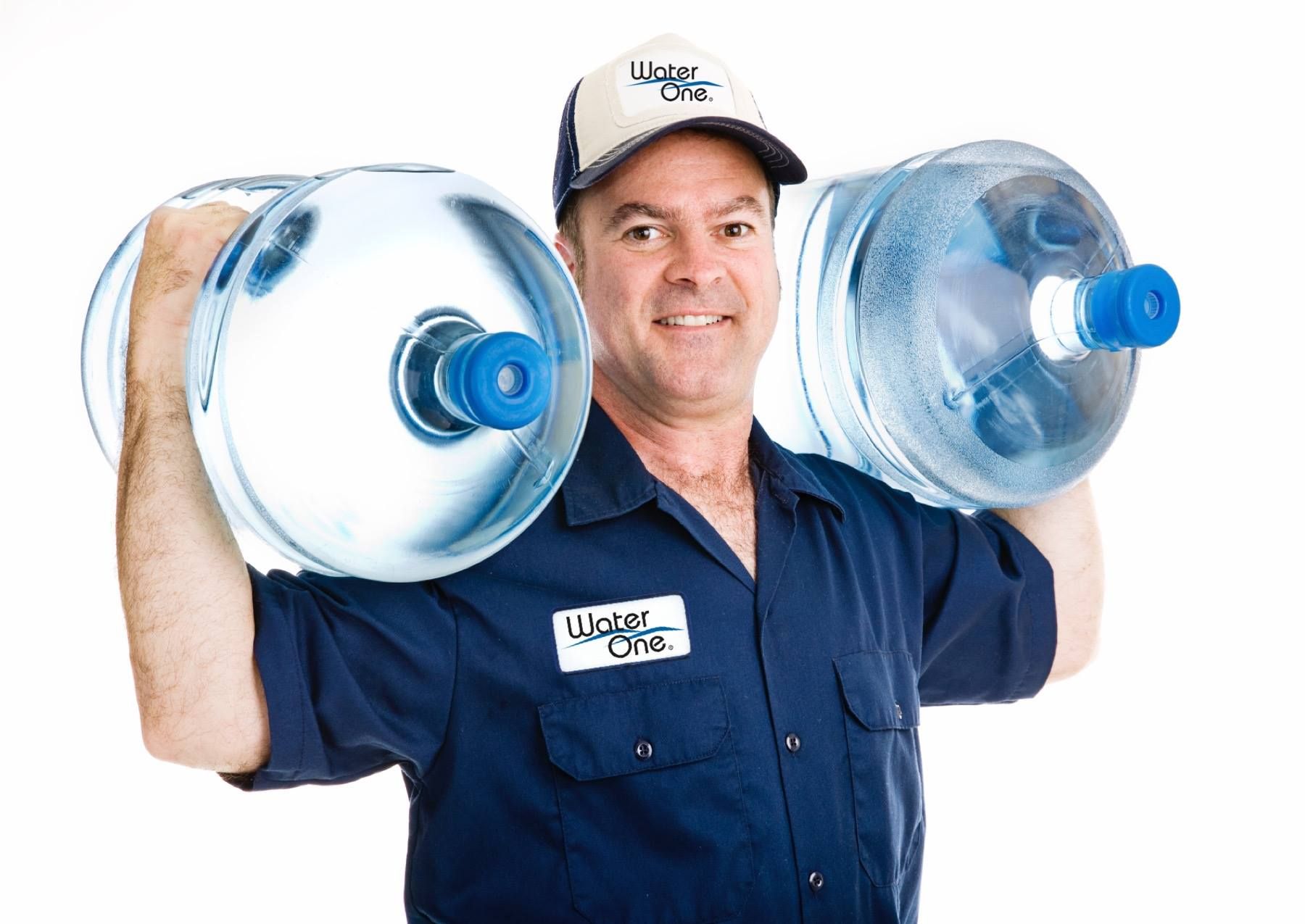 A man is carrying two bottles of water on his shoulders.