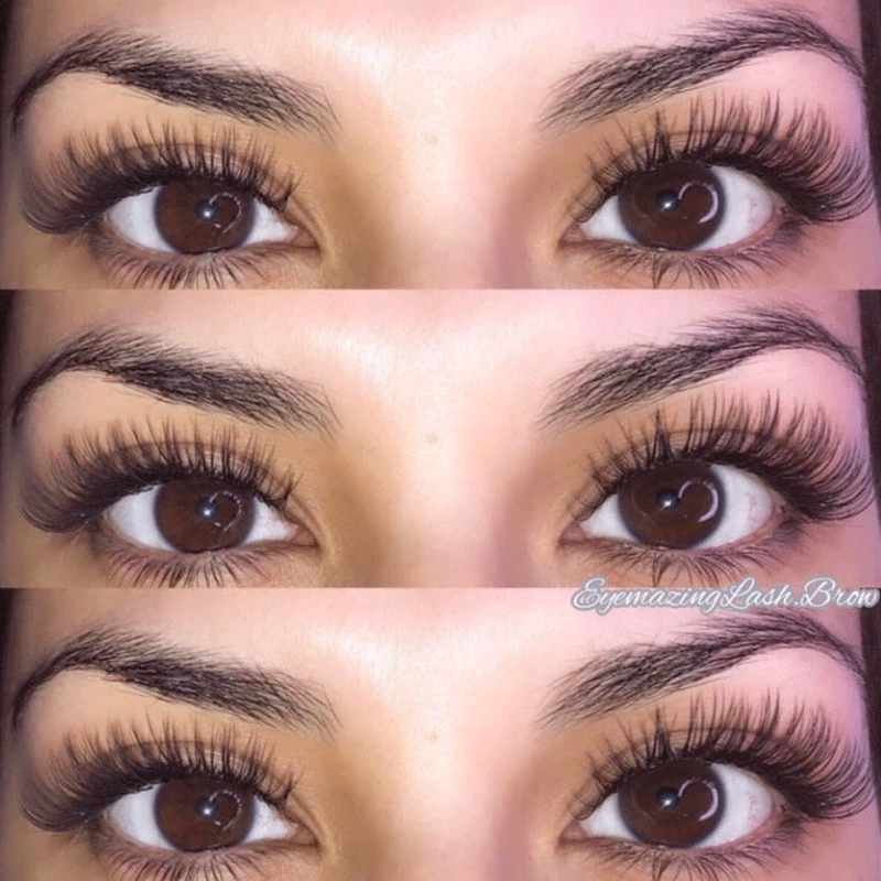 A close up of a woman 's eyes with long eyelashes