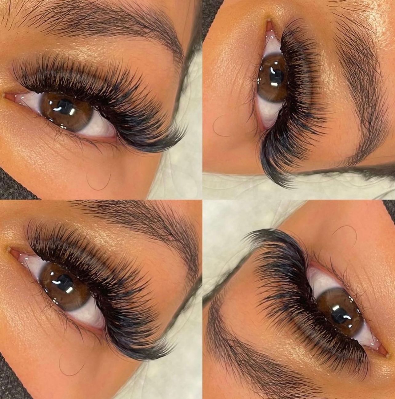 A close up of a woman 's eye with long eyelashes