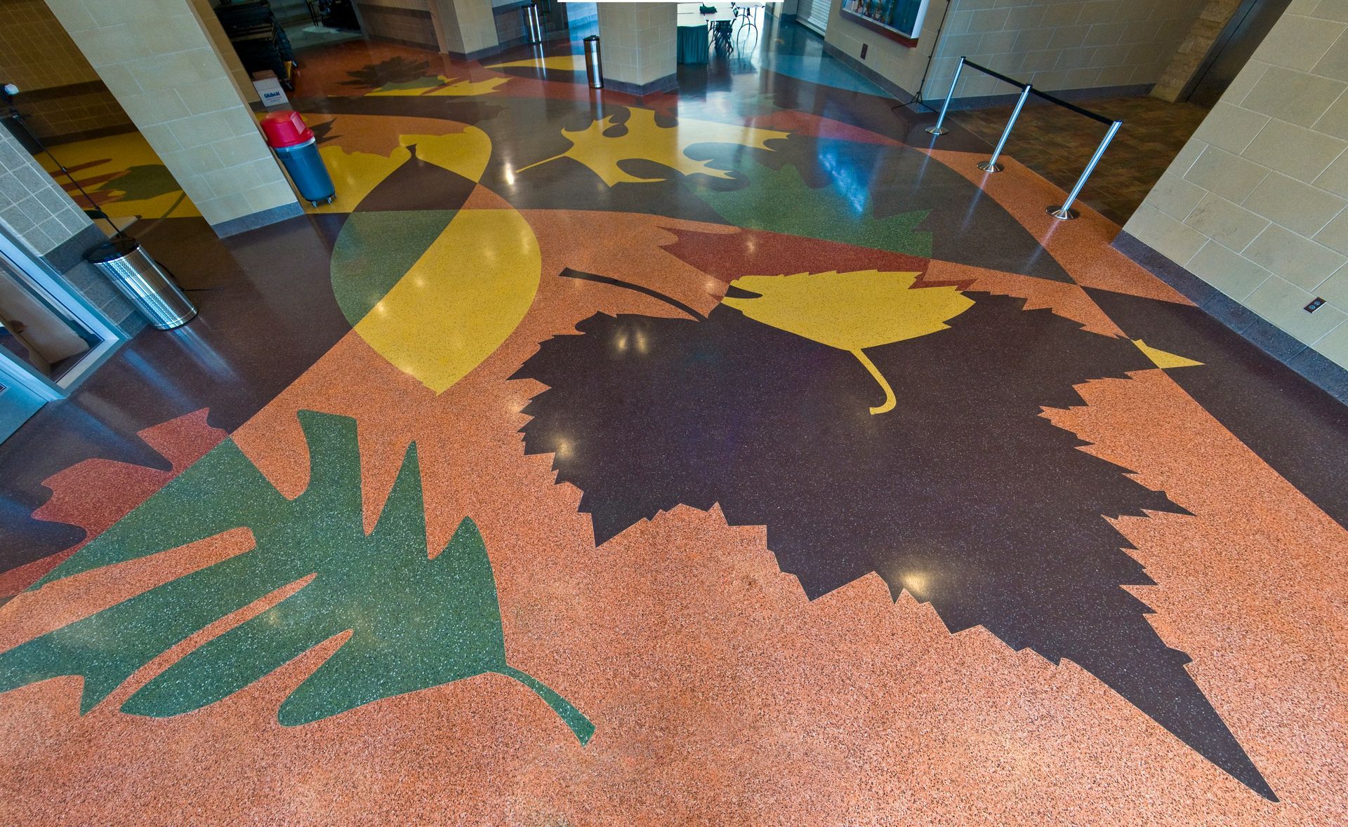 A colorful floor with leaves painted on it