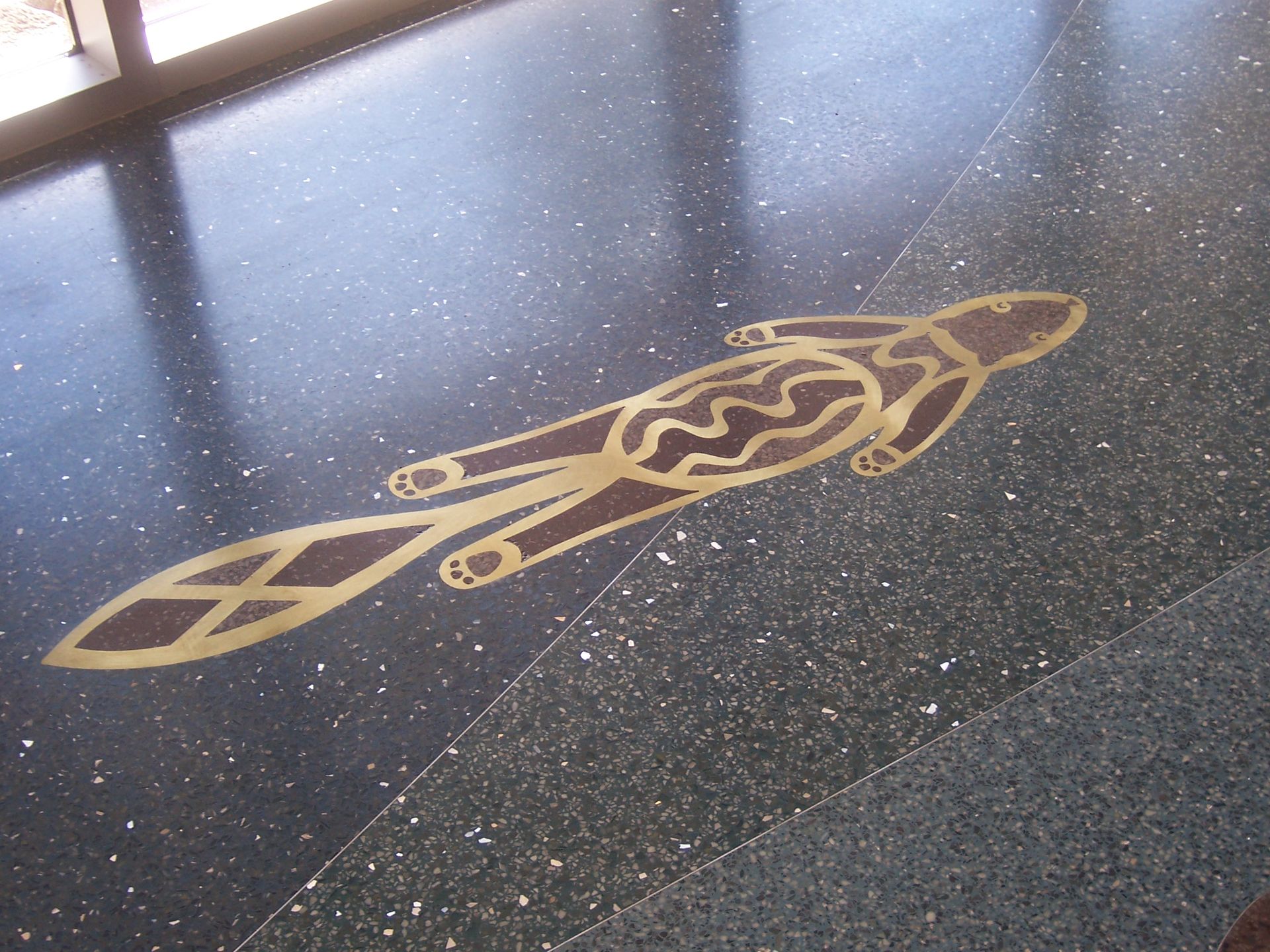 A drawing of a rocket on the floor of a building