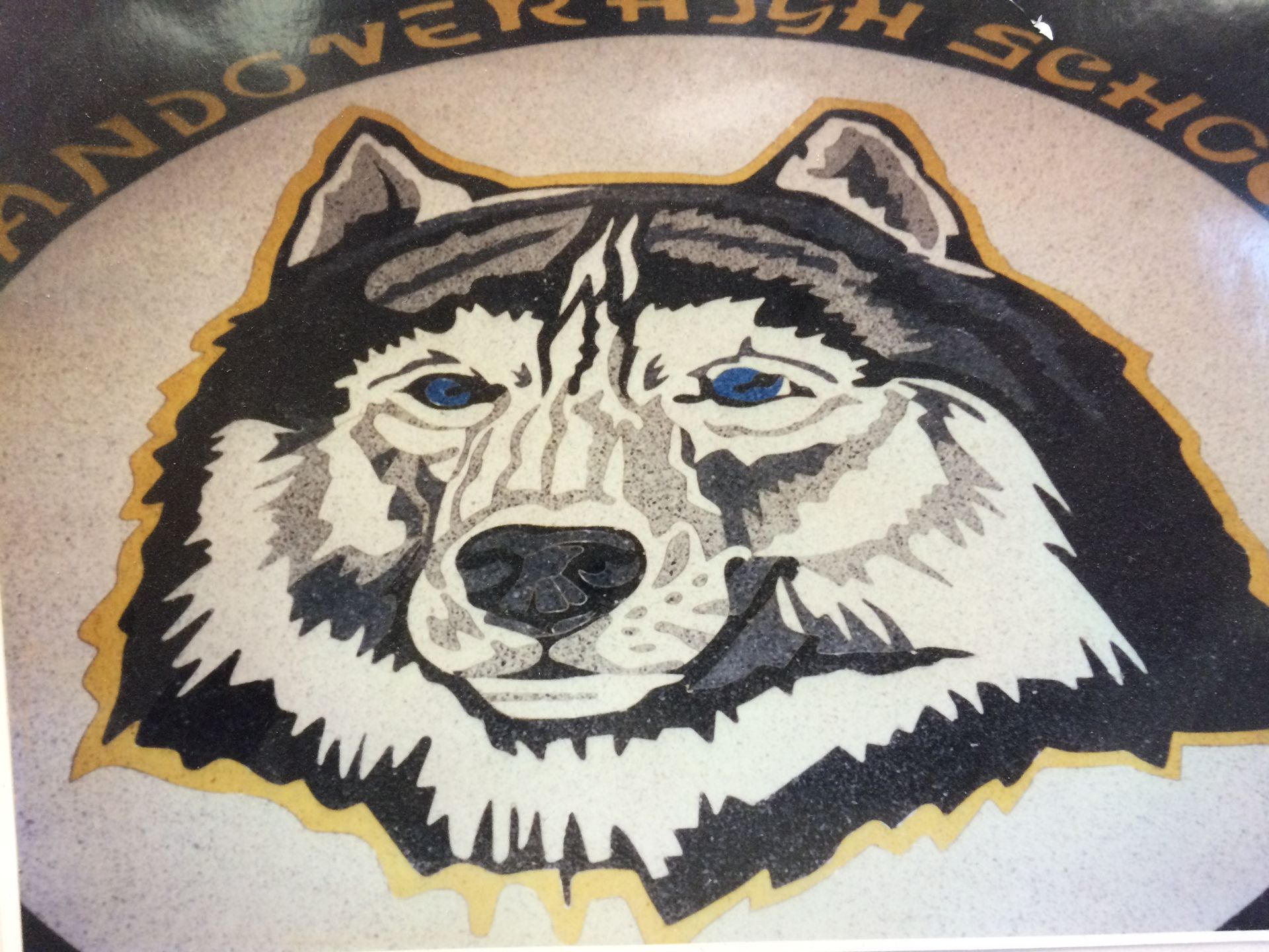 A picture of a husky with the words andover high school below it