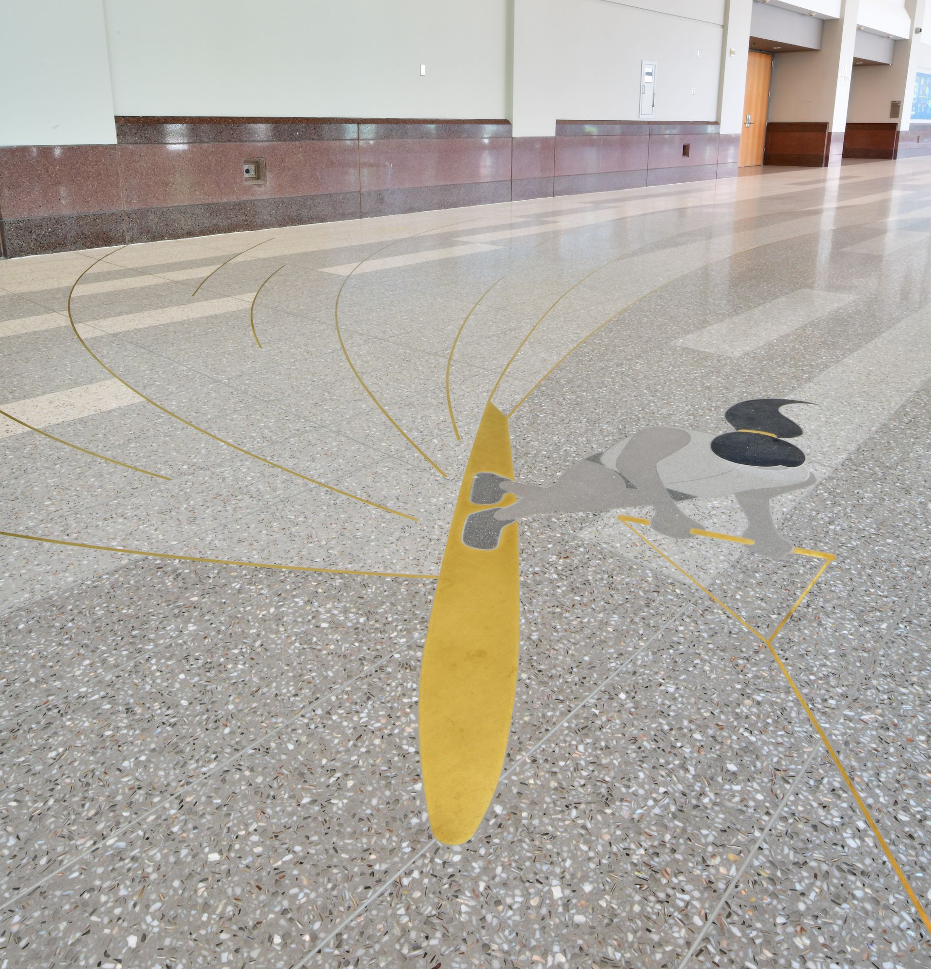 A drawing of a person on a surfboard on the floor