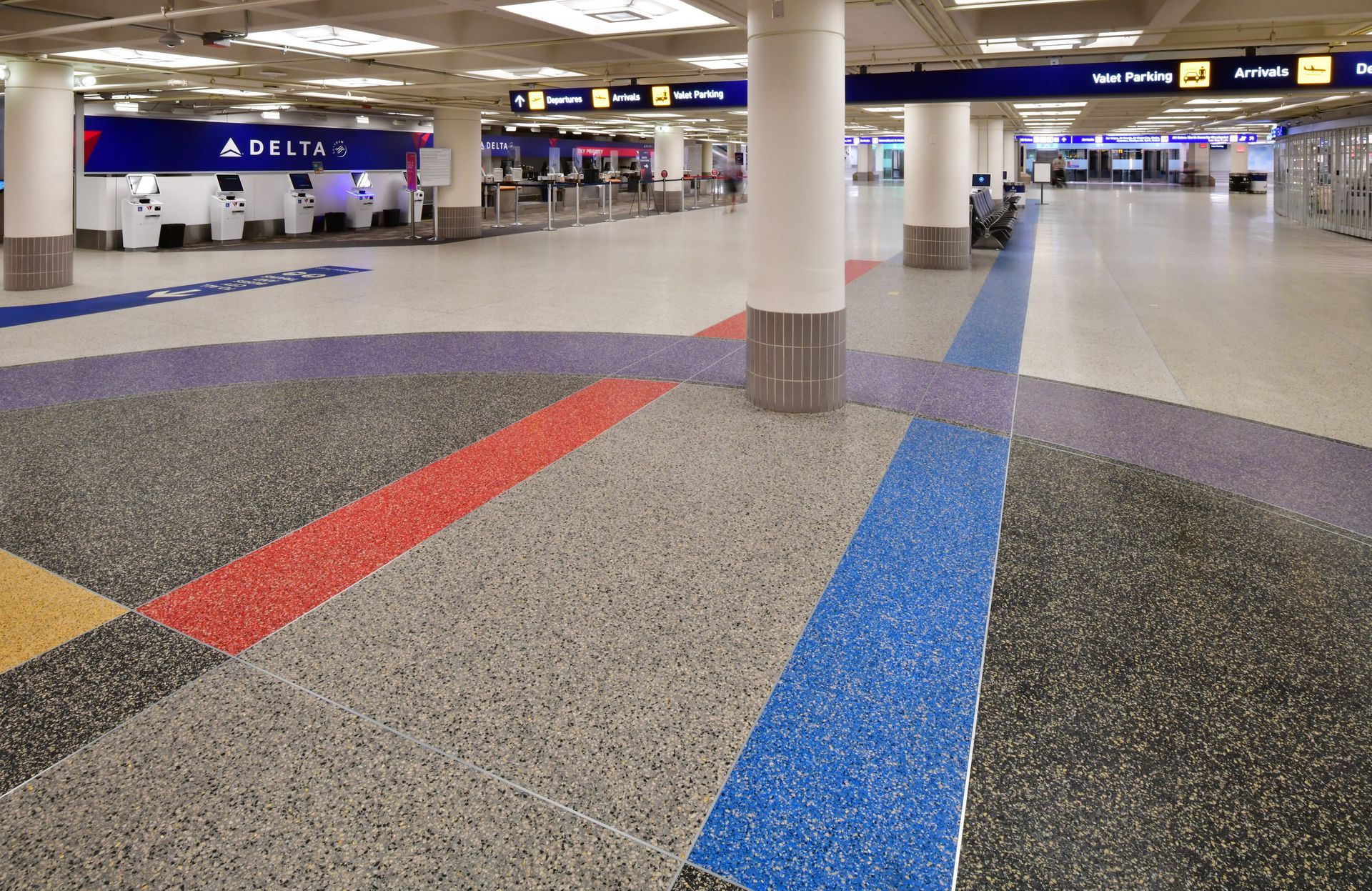 A delta airlines check in area at an airport