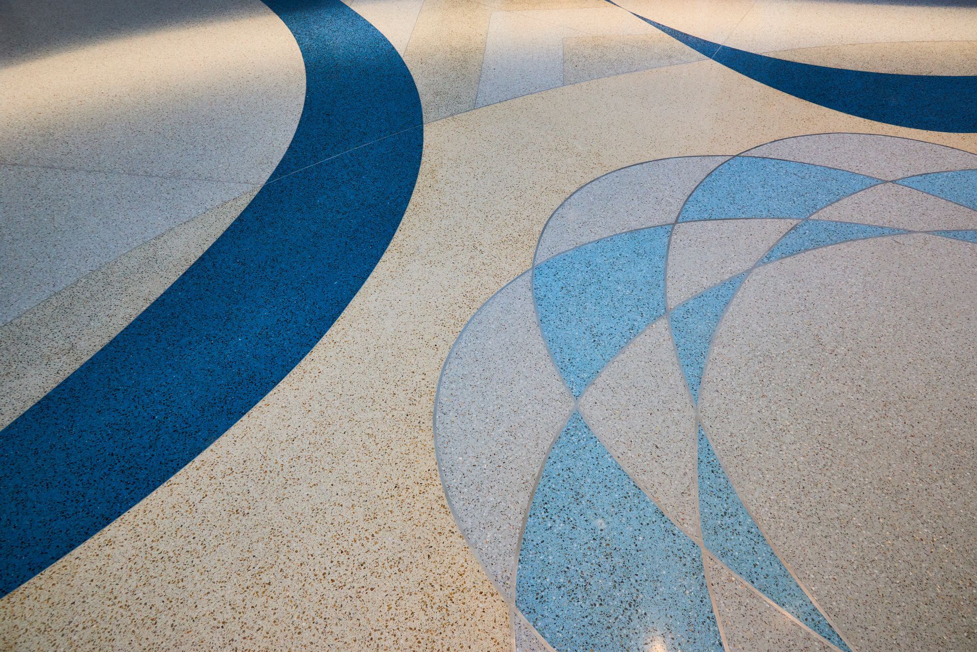 A blue and white floor with a pattern on it