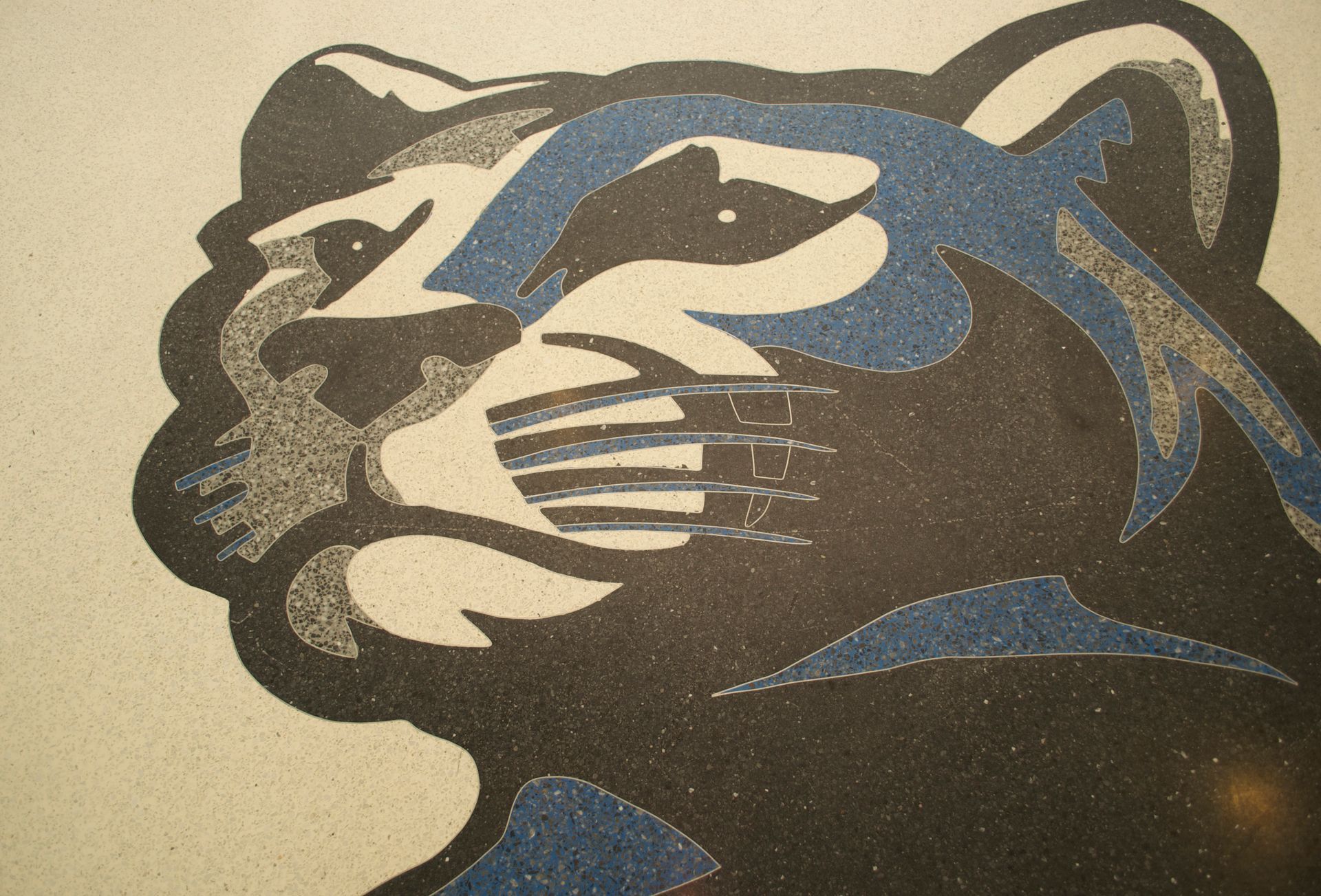 A black and blue drawing of a tiger 's head