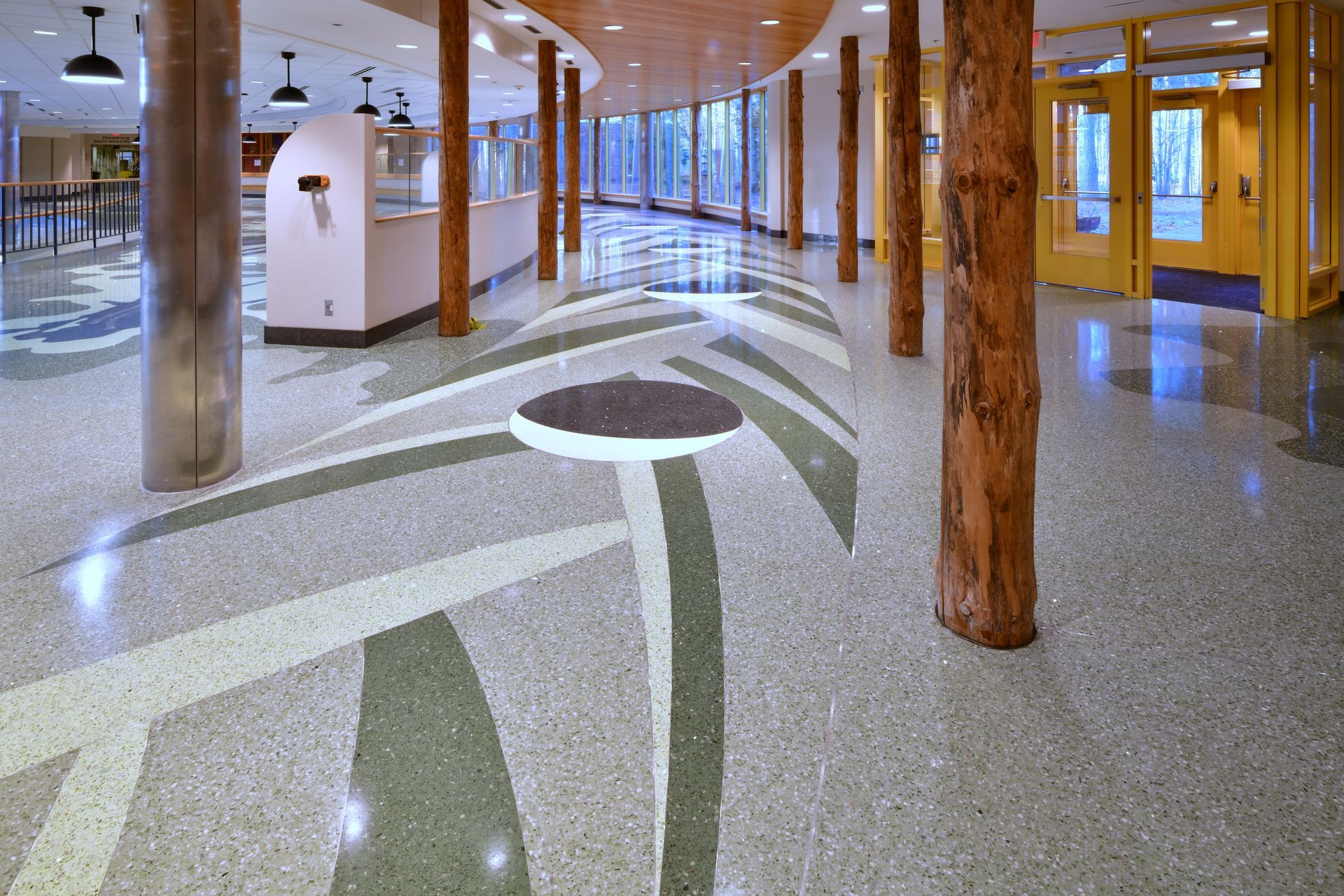 A hallway with a mushroom design on the floor