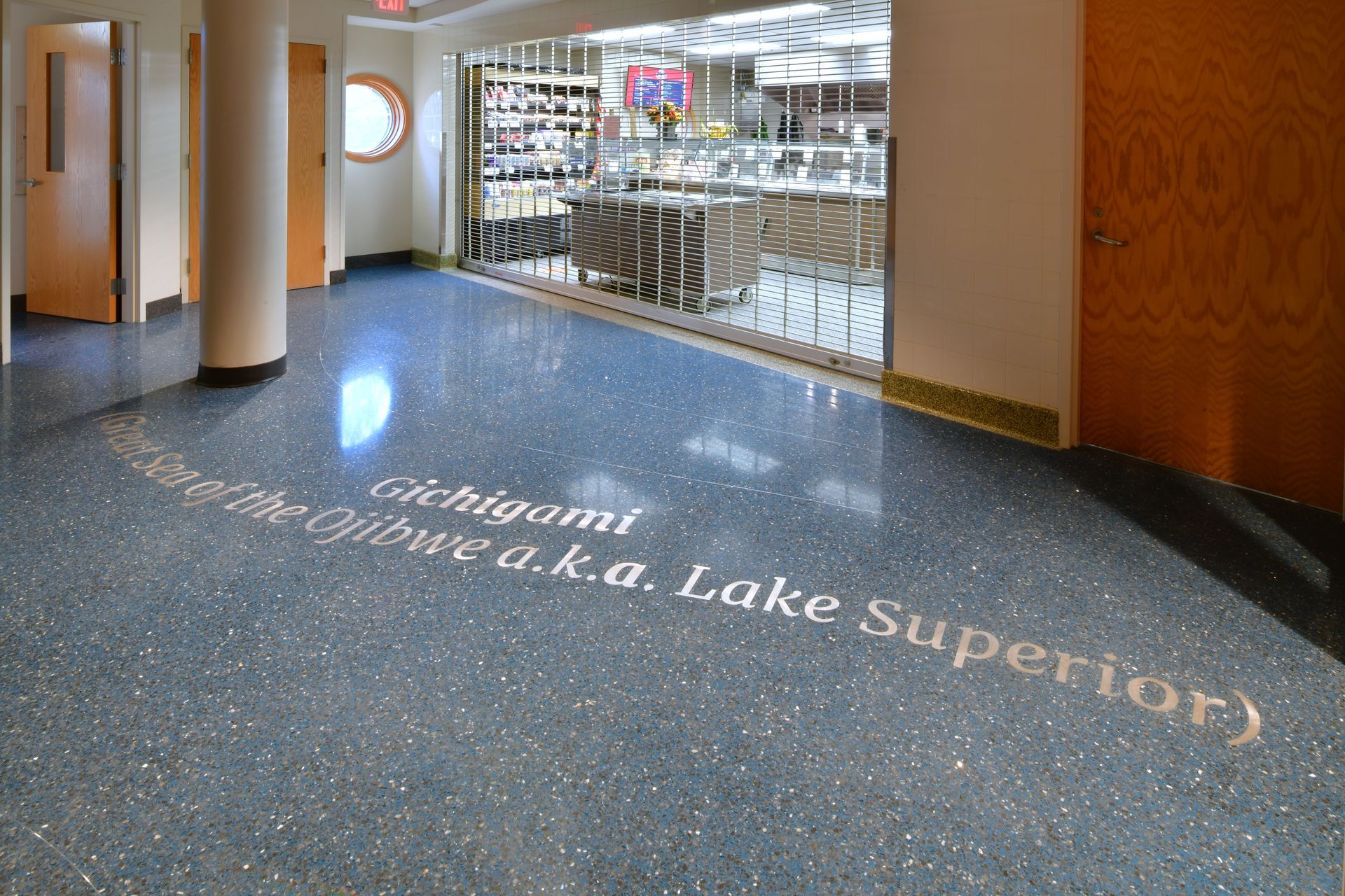 A hallway with the words lake superior written on the floor