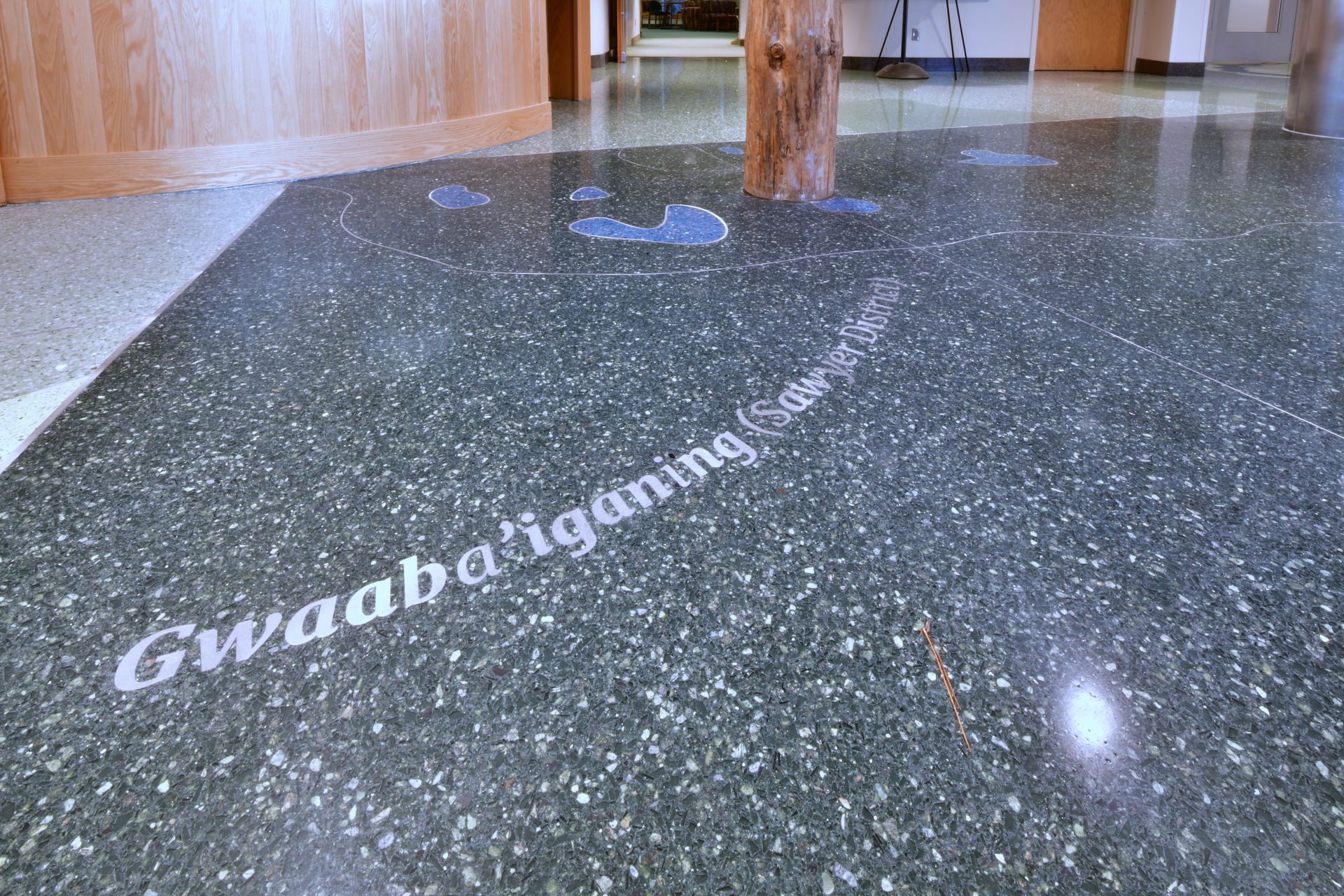 A concrete floor with the word gwaaba written on it