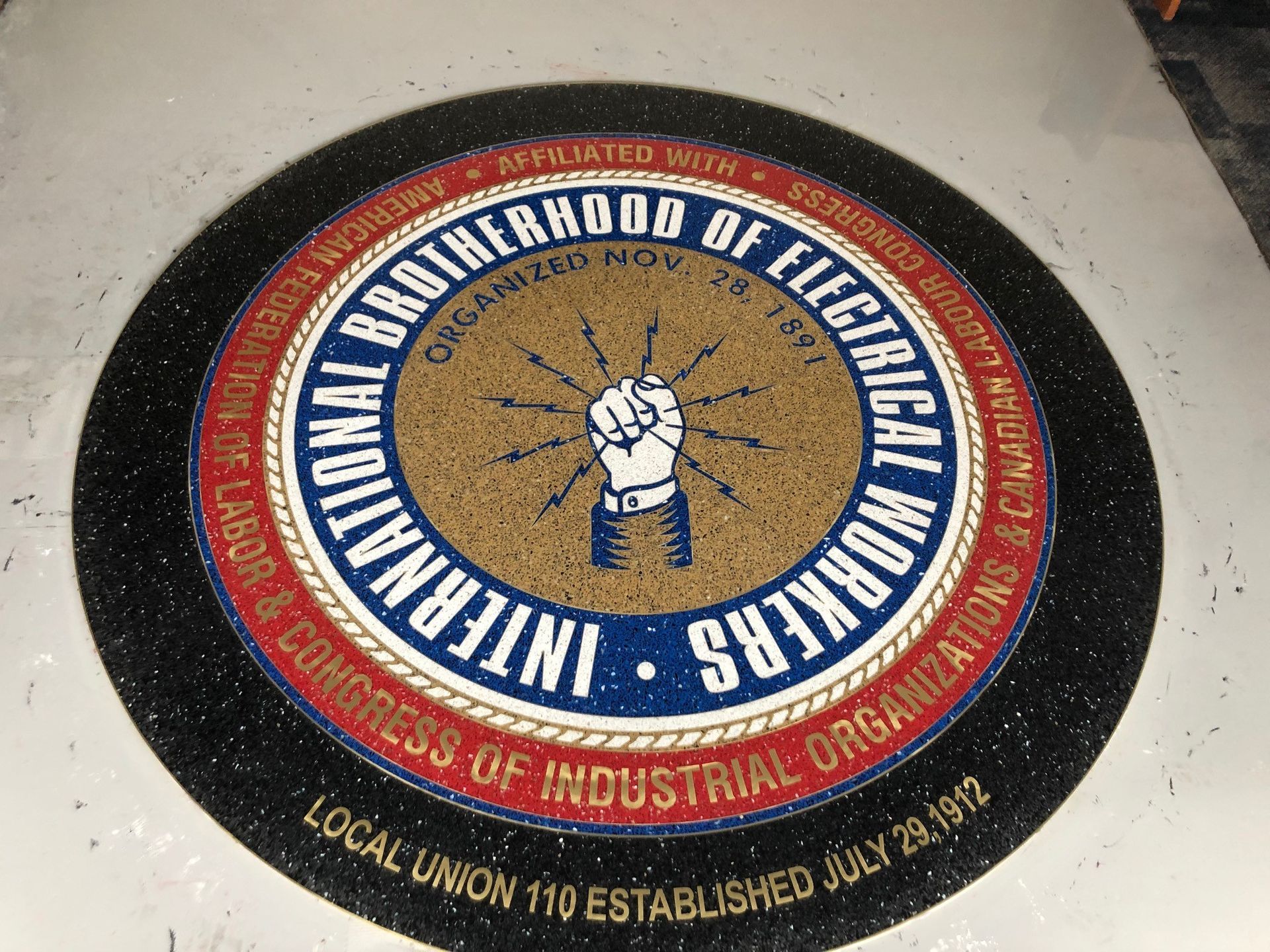 A logo for the international brotherhood of electrical workers
