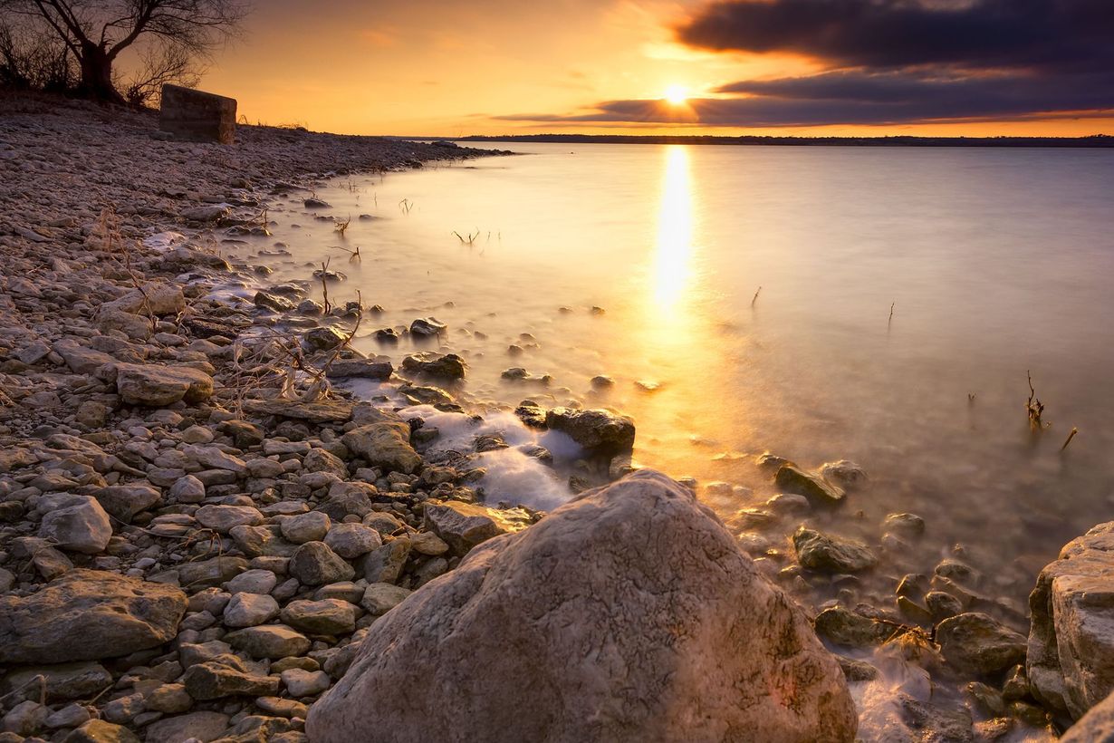 Rocky shoreline at sunset