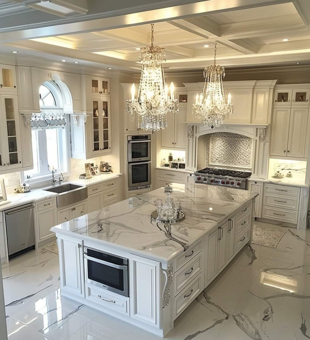 There is a large island in the middle of the kitchen.