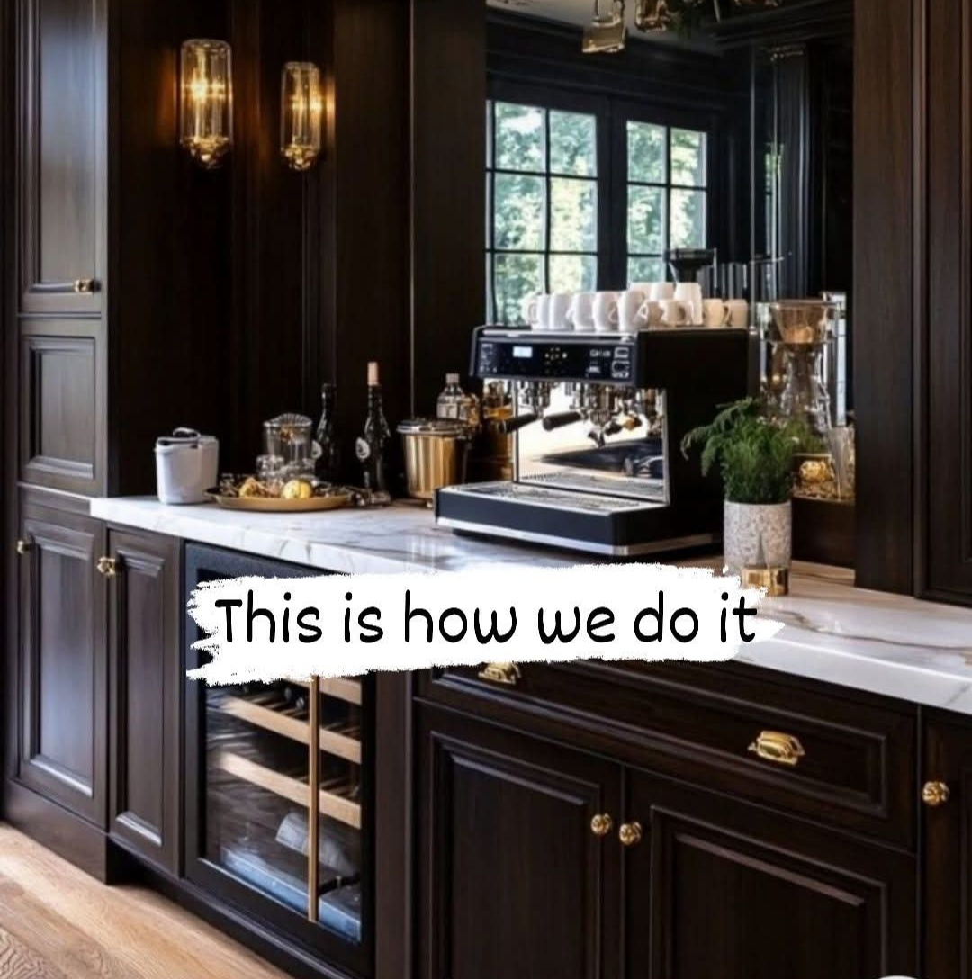 A kitchen with the words this is how we do it above it