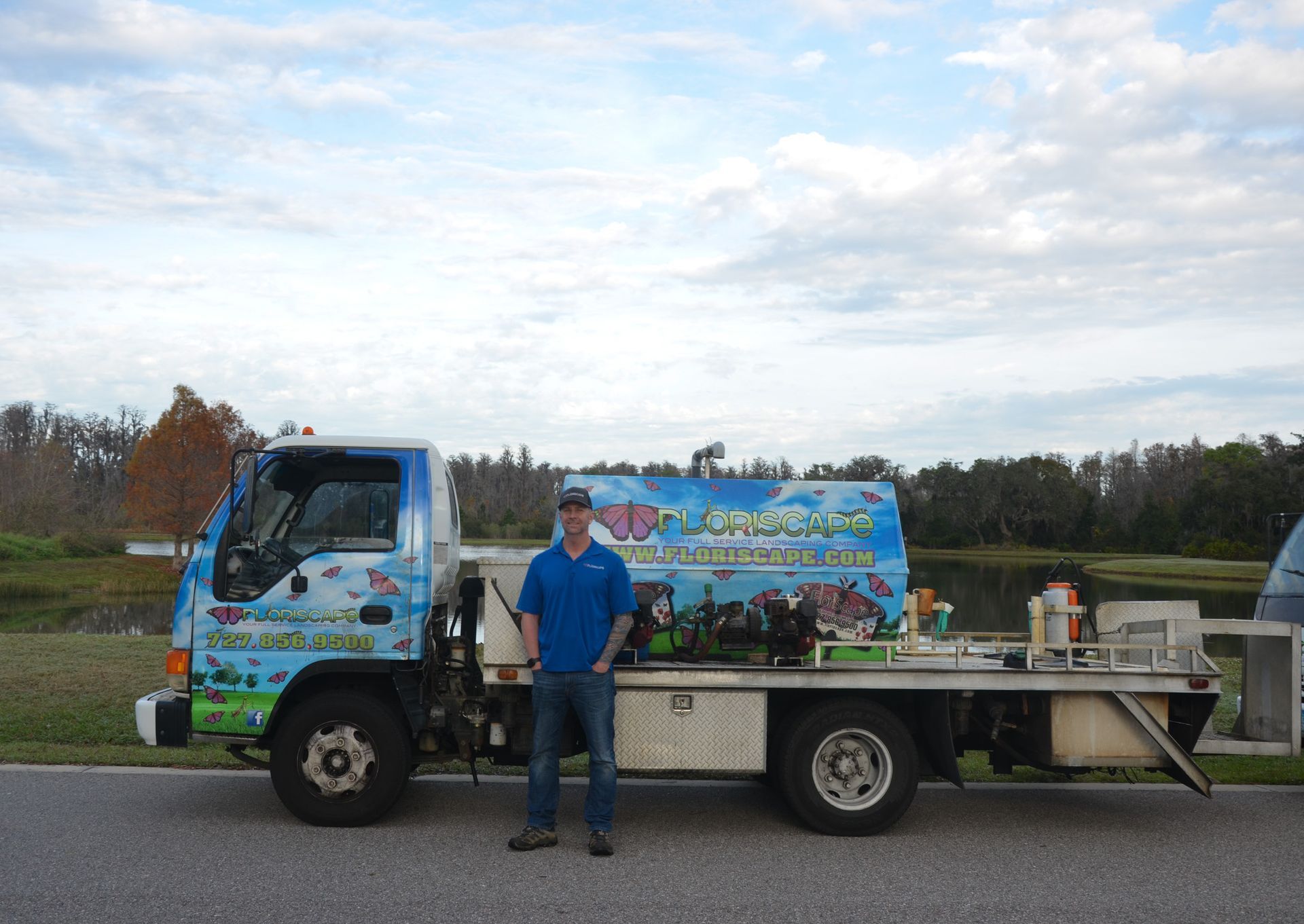 a man standing in front of a truck