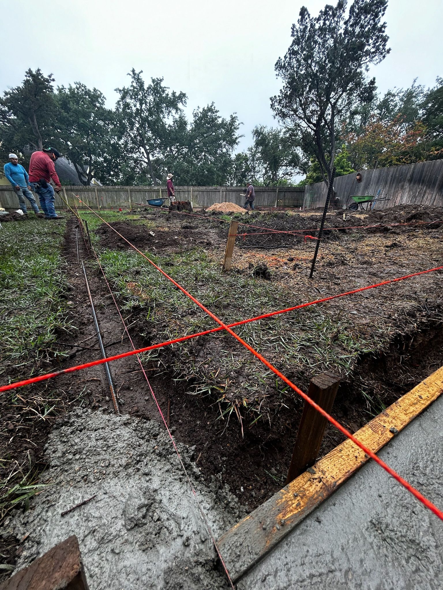 A group of people are working on a construction site.