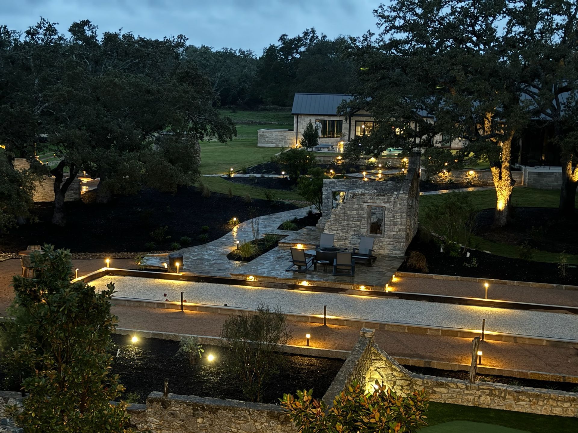 An aerial view of a house with lots of lights