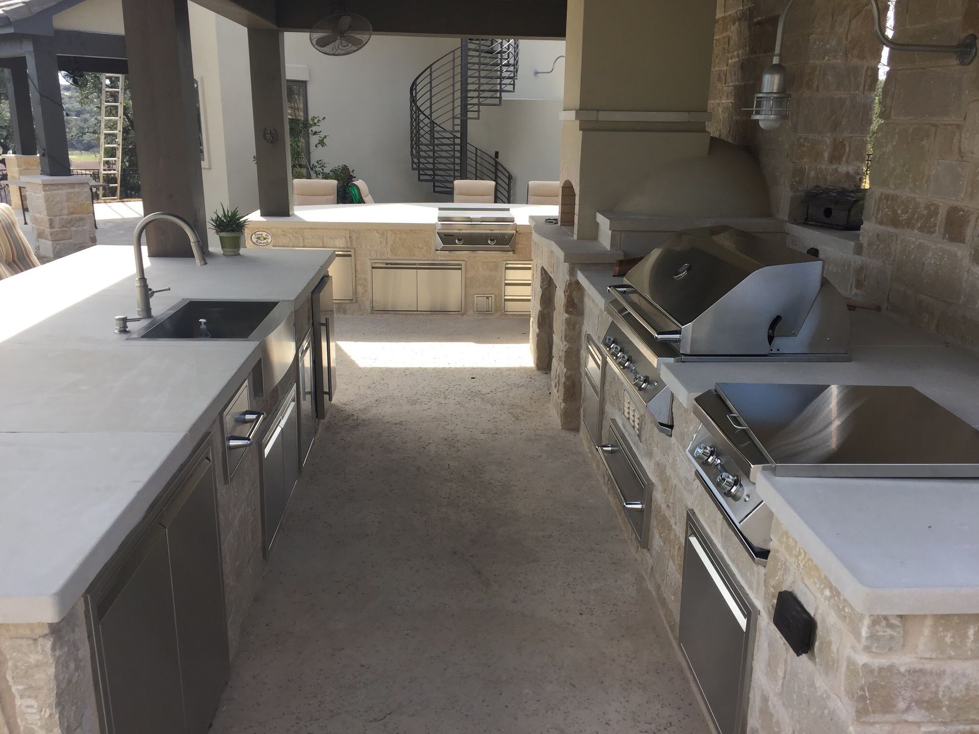 A kitchen with stainless steel appliances and a sink