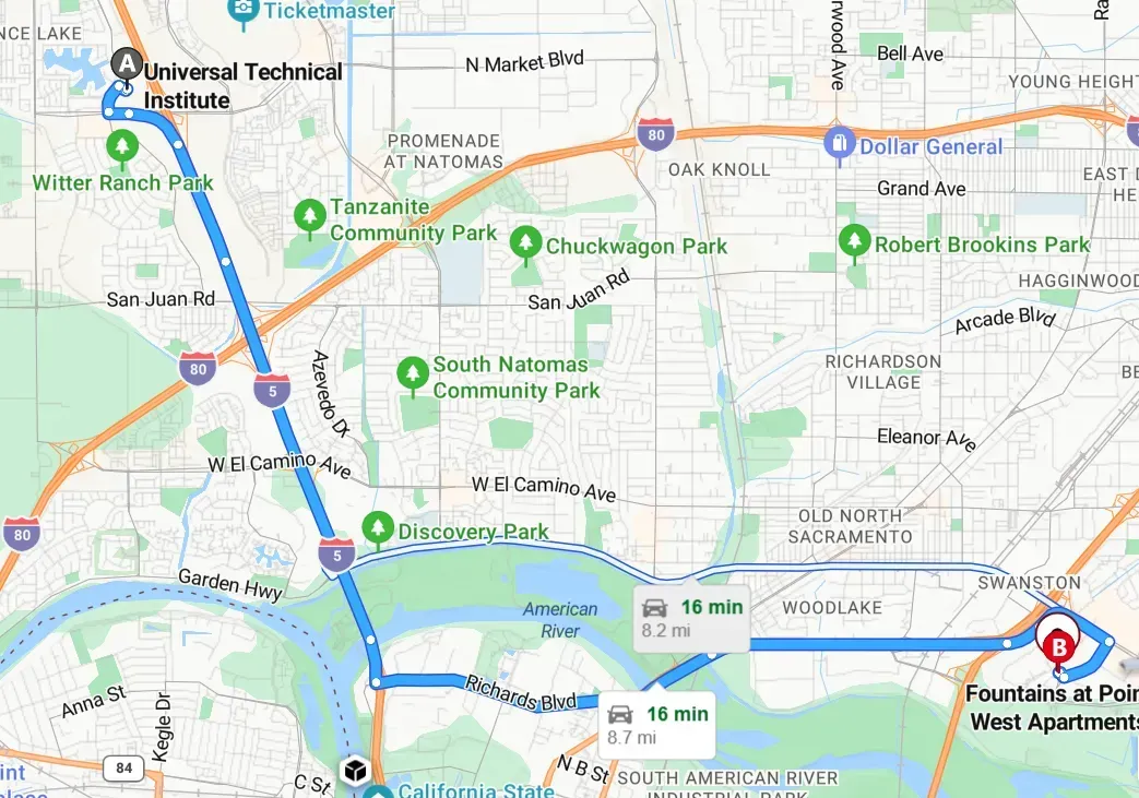 Map screenshot showing a blue route line and traffic on city streets between two locations.