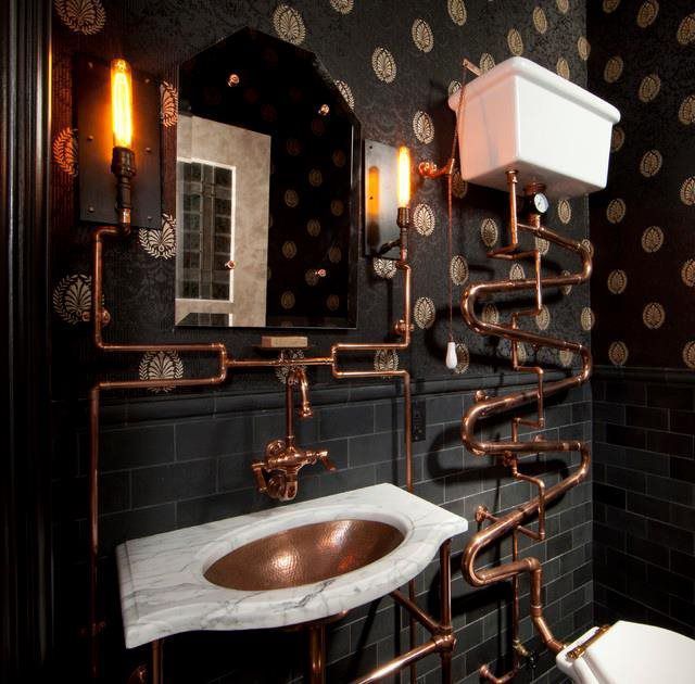 A bathroom with copper pipes and a toilet