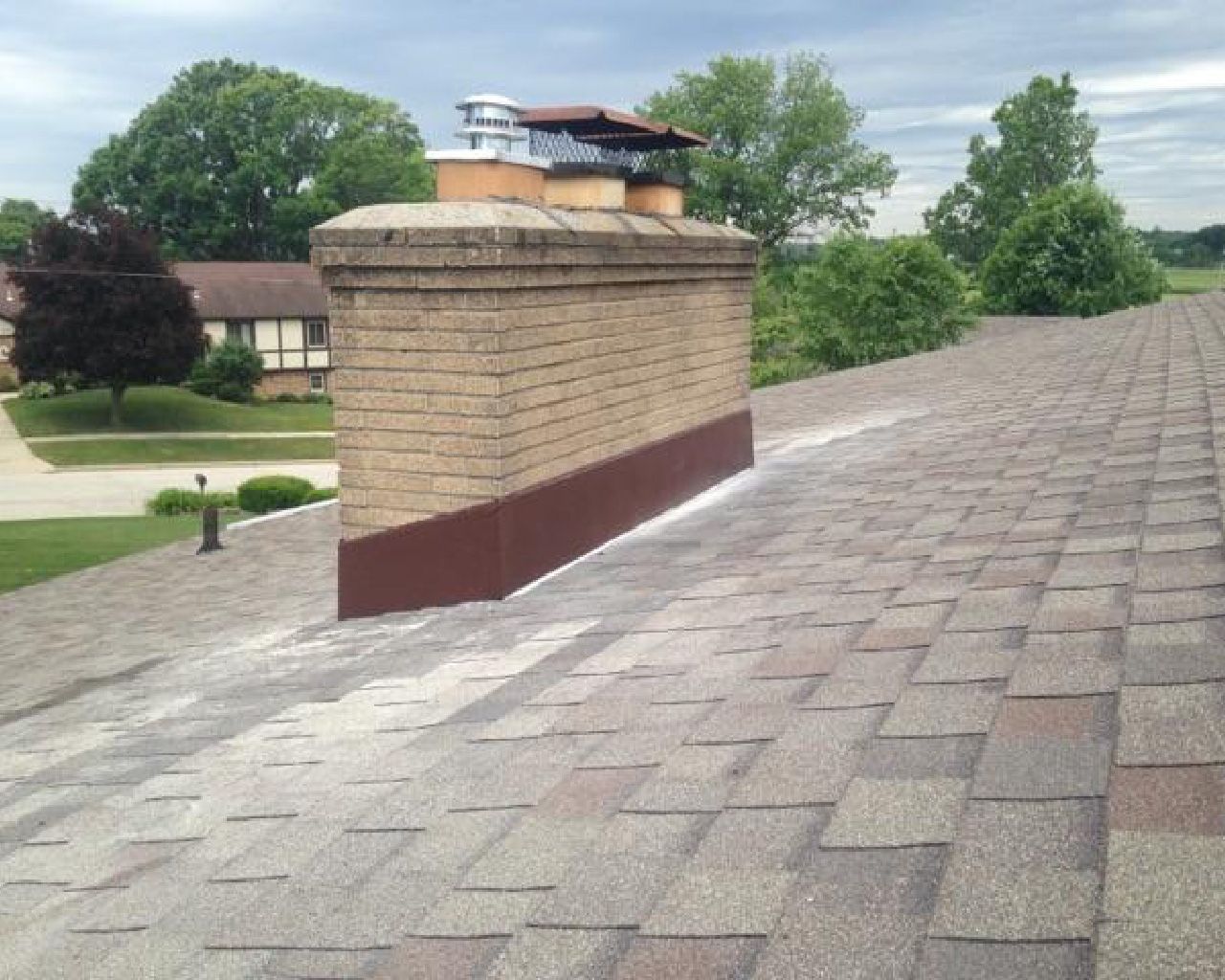 A roof with a chimney on top of it