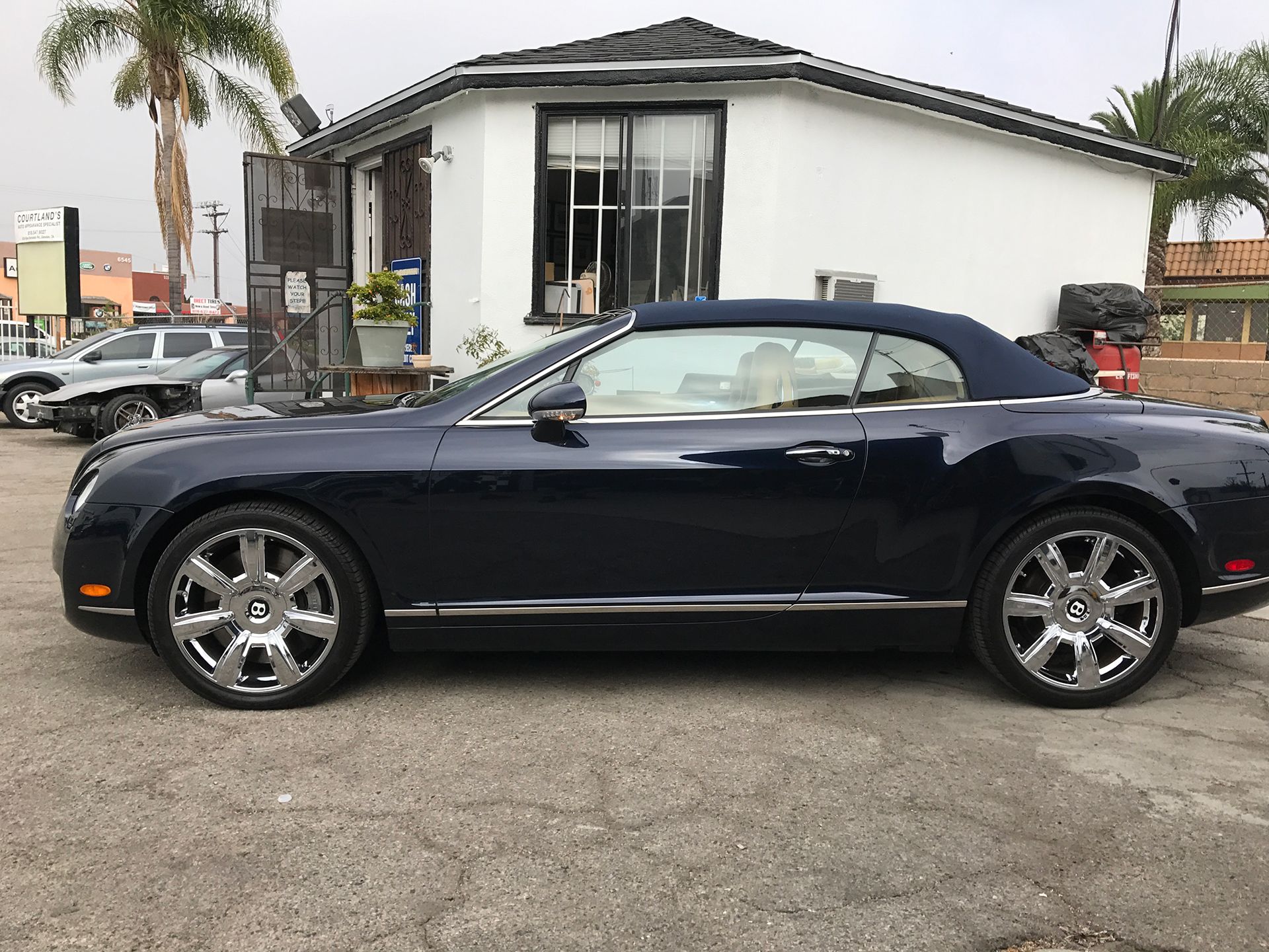 Black Bentley convertible side view