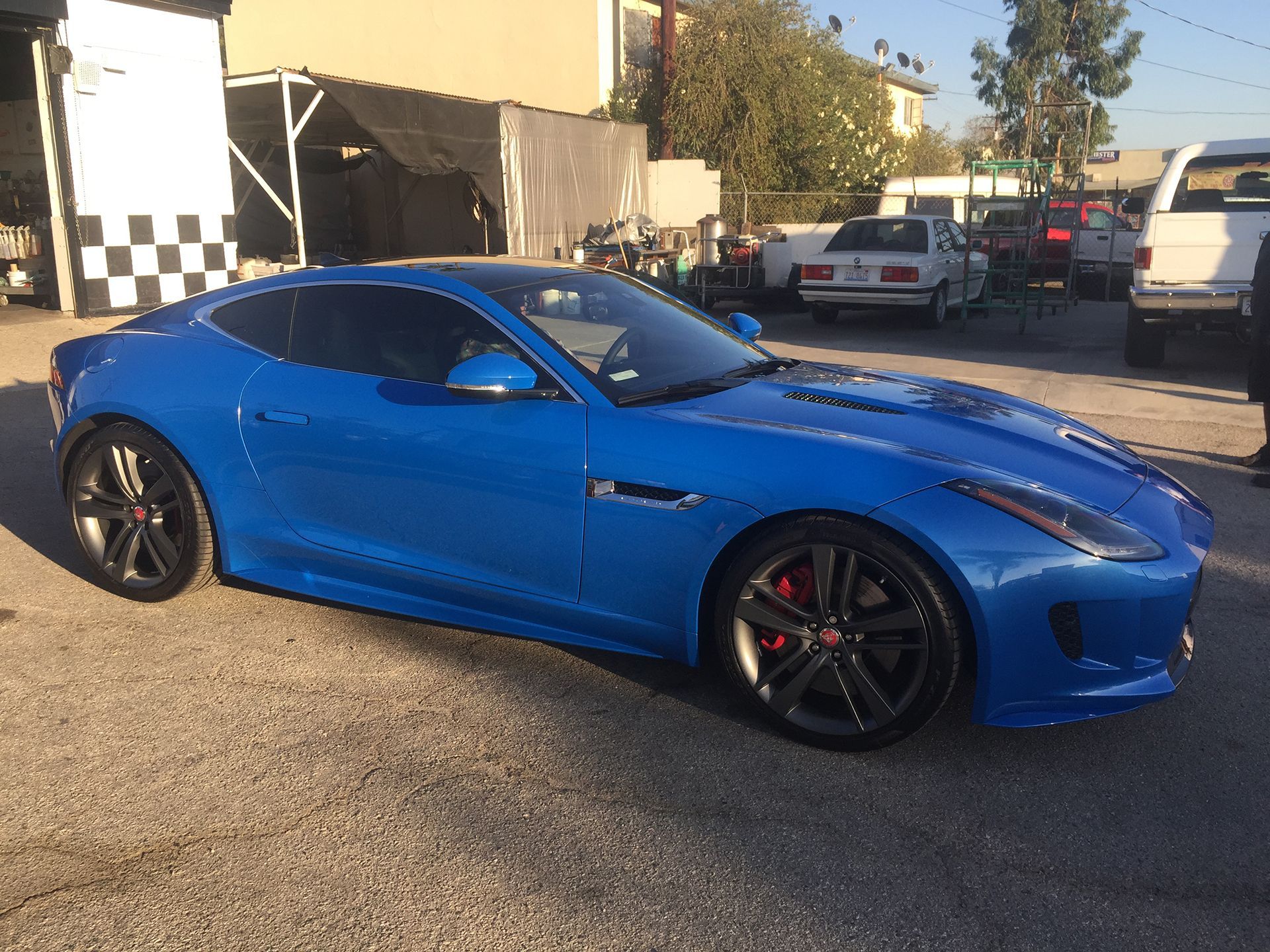 Blue Jaguar F-Type side view
