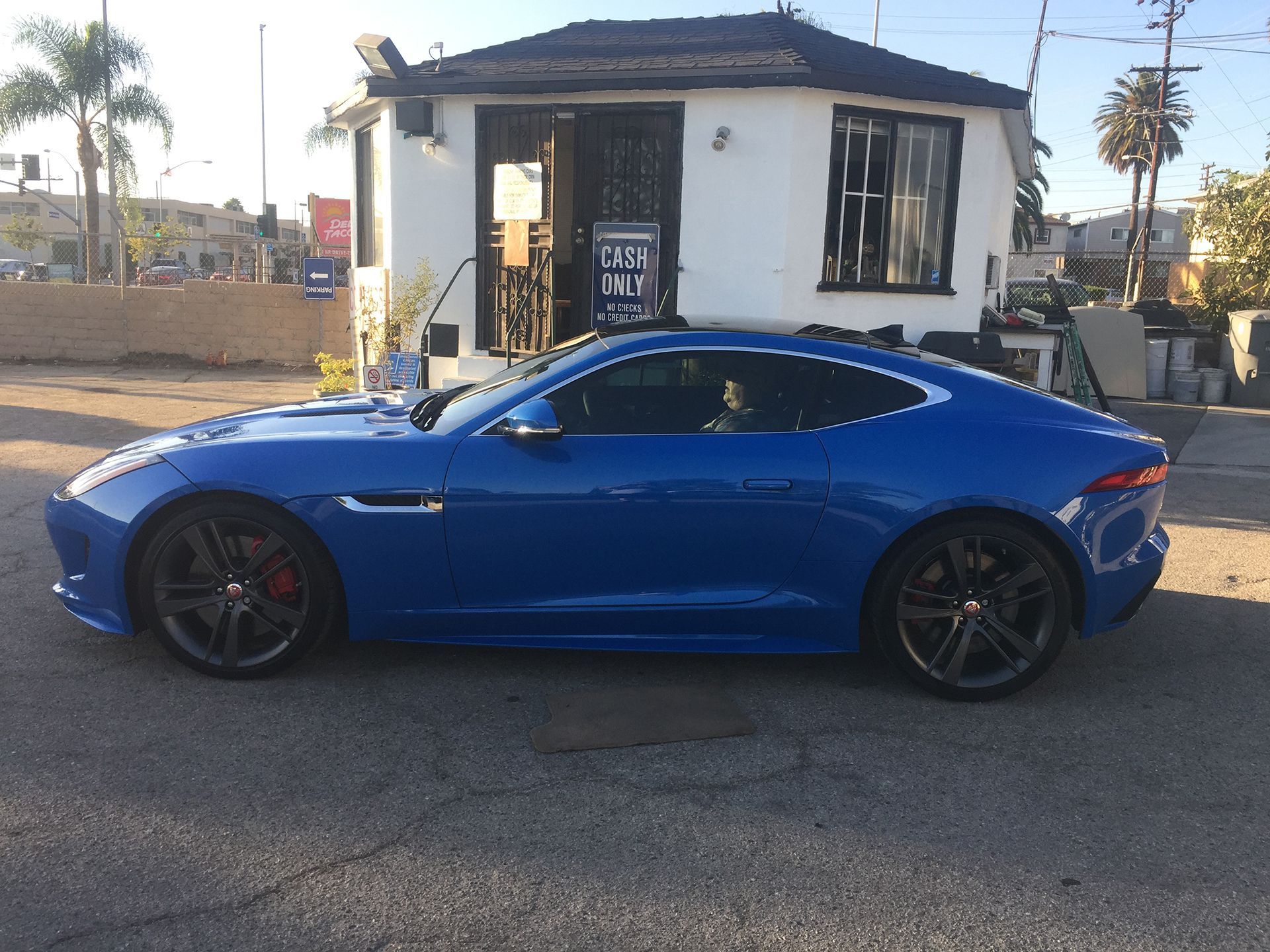 Blue Jaguar F-Type left view