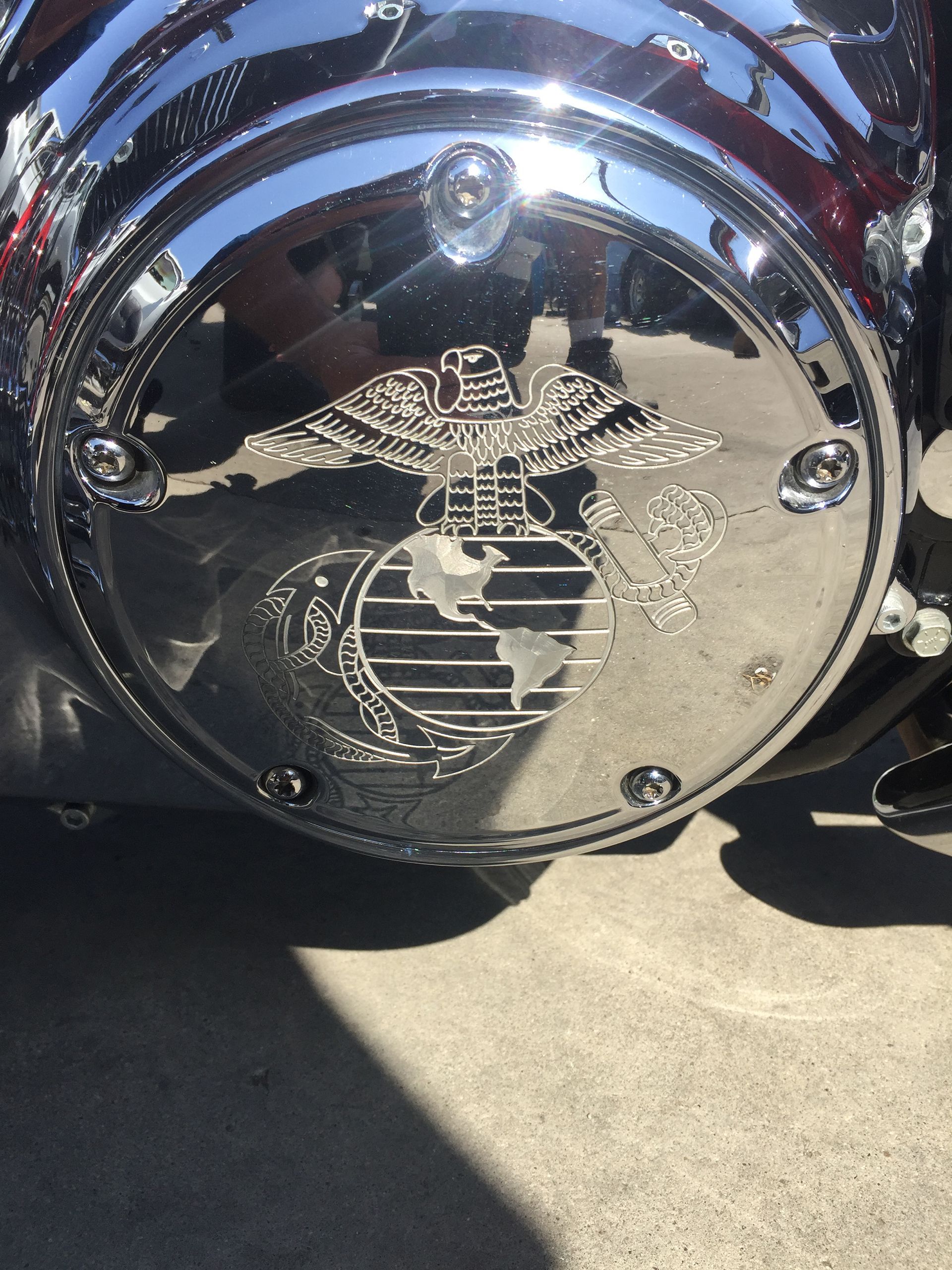 United Stated Marine Corps logo etched on a Mustang motorcycle