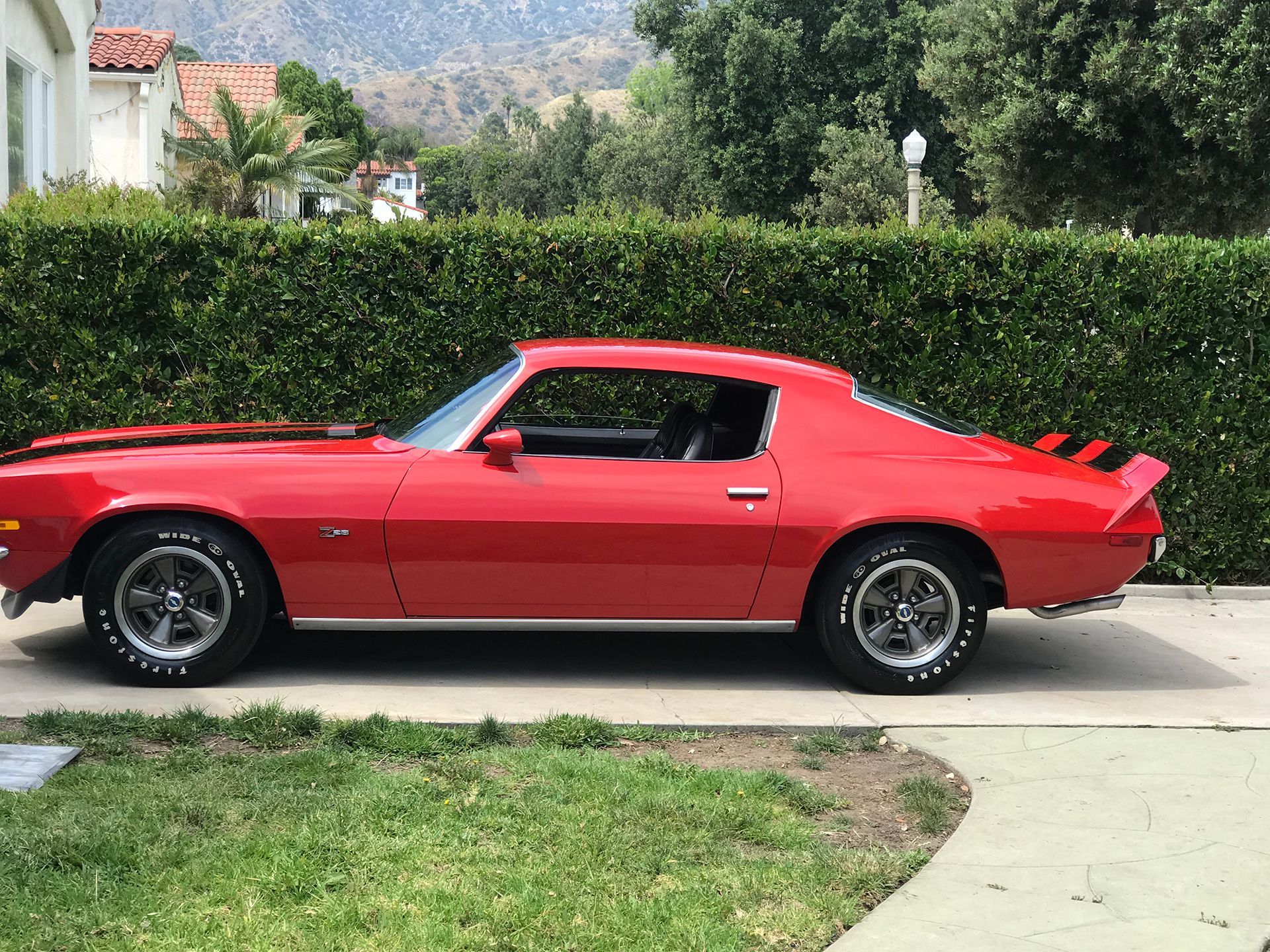Red Chevrolet Camaro Z28 side view