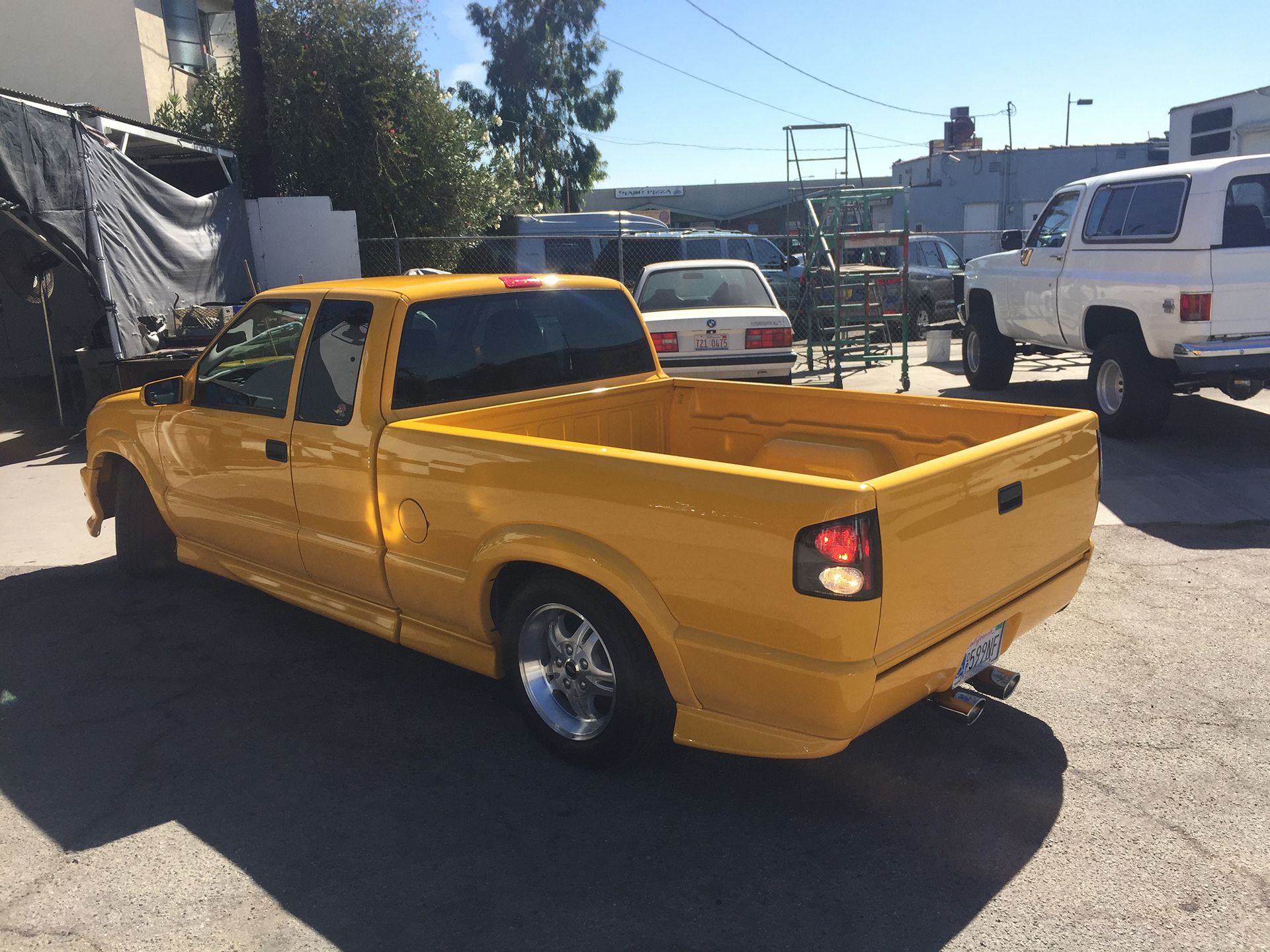 Chevrolet yellow pickup back view