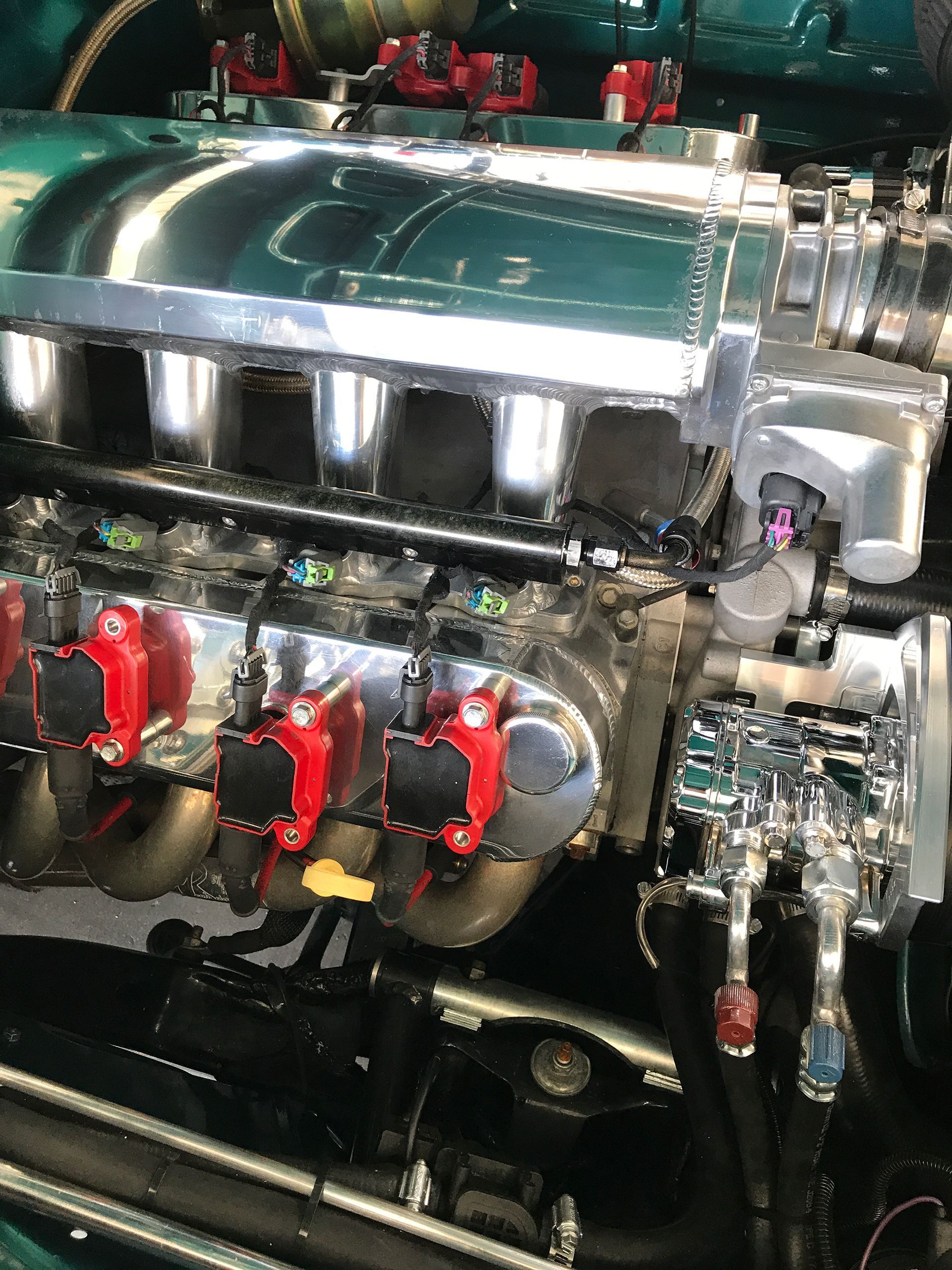 Green Chevrolet Bel Air engine side view