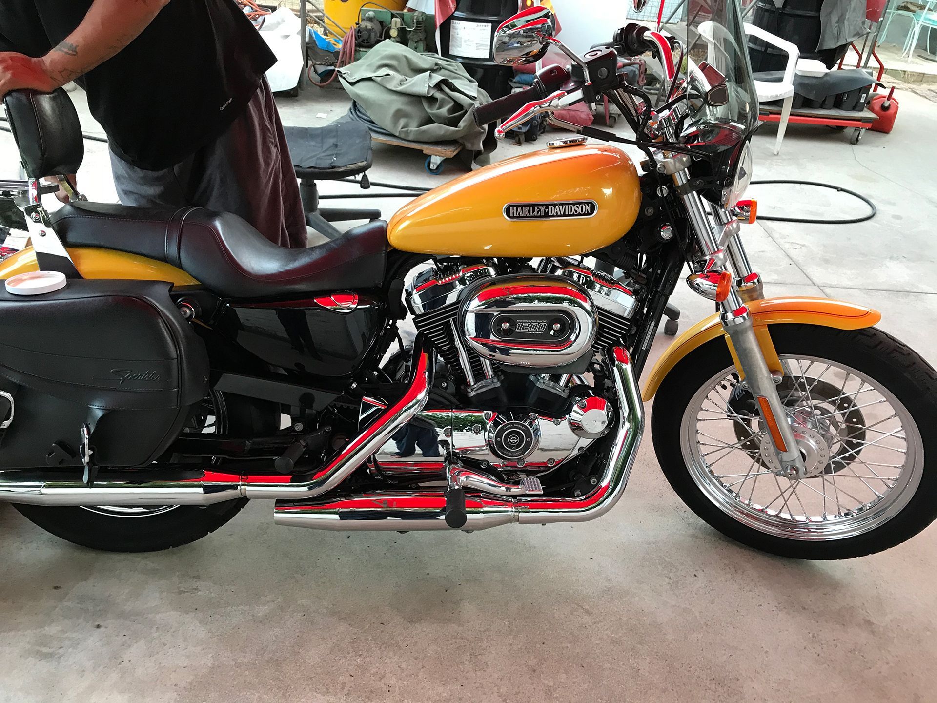 Harley Davidson motorcycle with yellow and orange paint