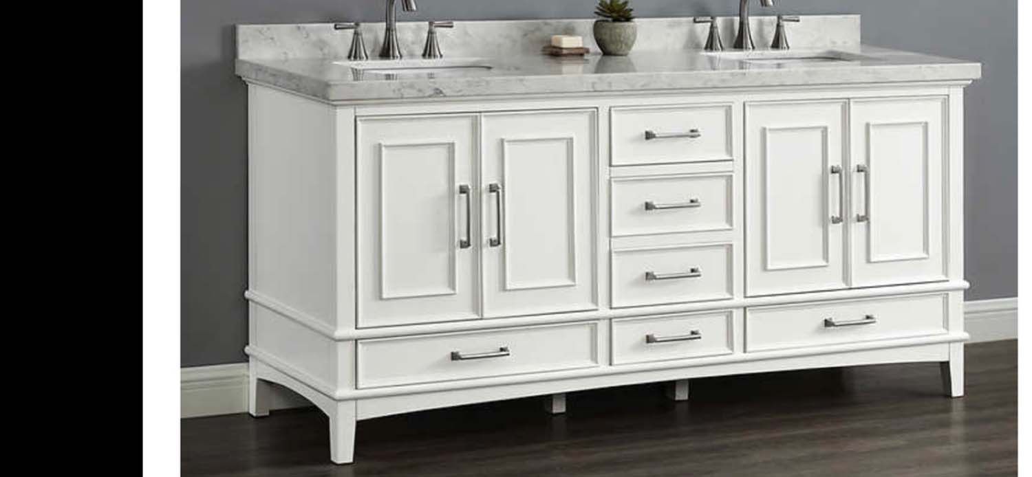 White double bathroom vanity with a granite countertop, drawers, and cabinet doors.