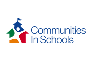 Communities In Schools logo. A house shape with a person inside, surrounded by colorful arrows. Blue text.