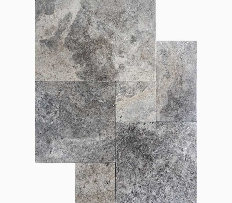 Gray stone tiles in a rectangular pattern, textured with variations in color and pattern.