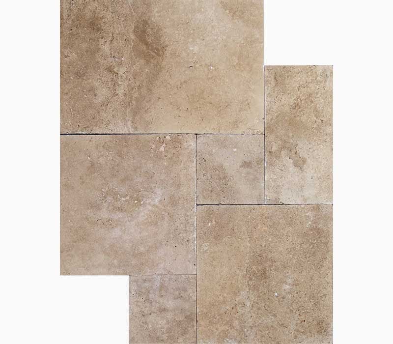 Beige travertine stone tiles in a unique pattern.