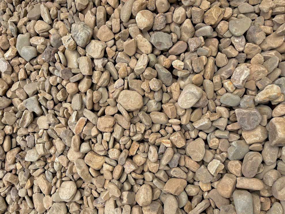 Pile of small, tan and gray gravel stones.
