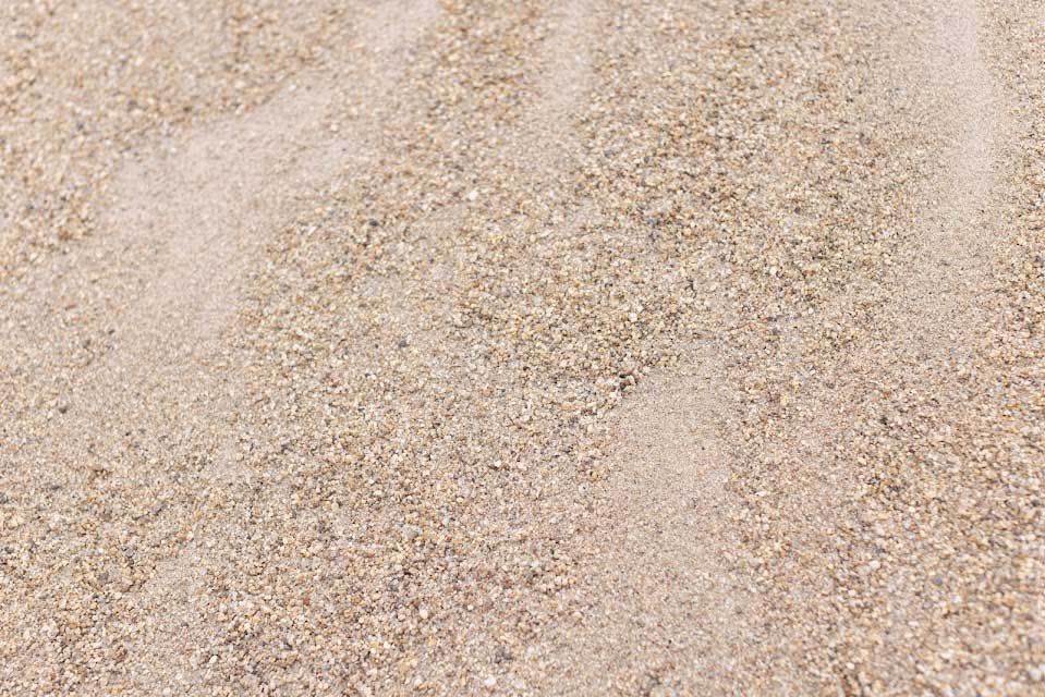 Beige sand, close-up view.