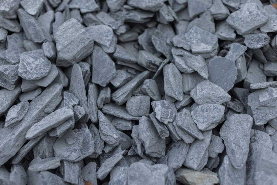 Pile of gray slate gravel.