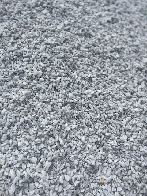 Pile of small, gray gravel.