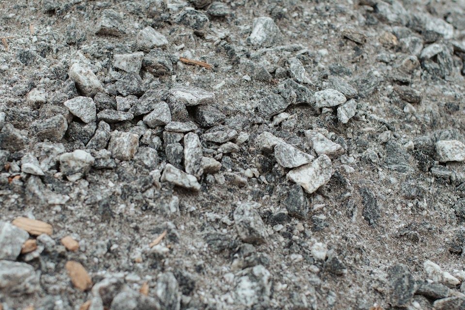 Close-up of a pile of gray crushed stone and gravel.