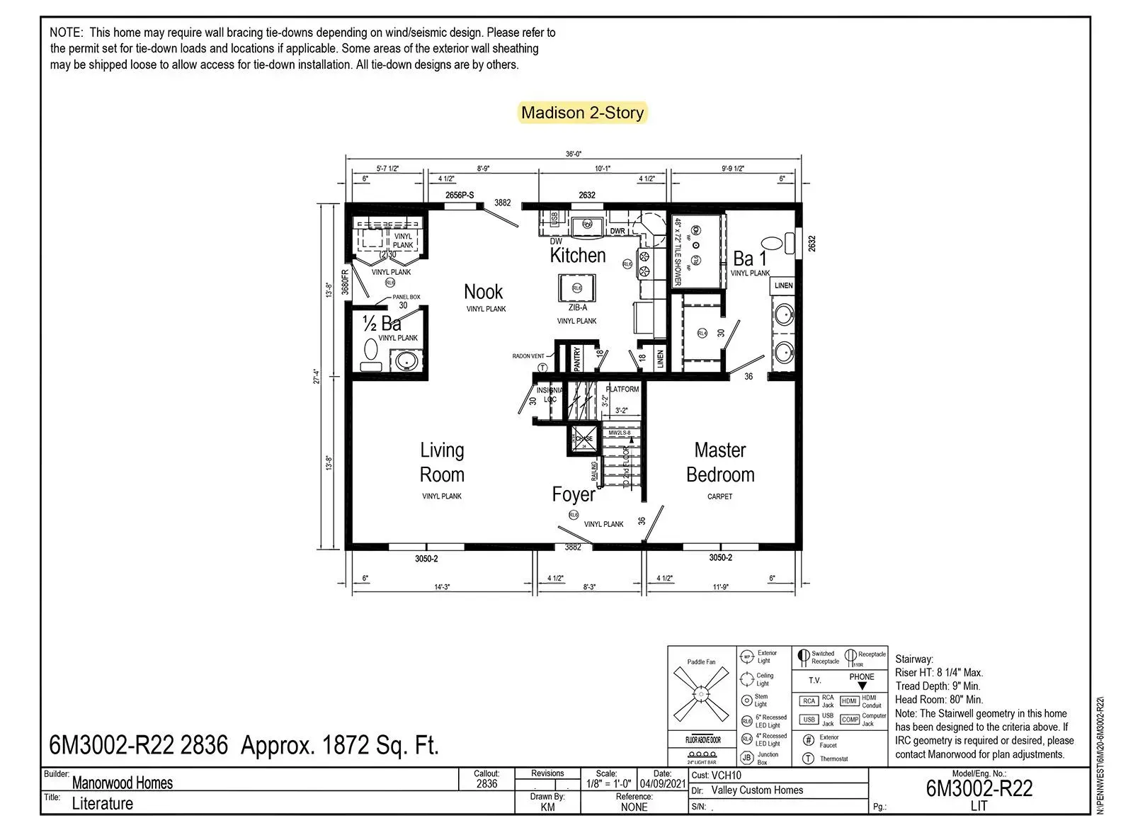 Floor plan of a house with kitchen, living room, master bedroom, and two bathrooms, with dimensions.
