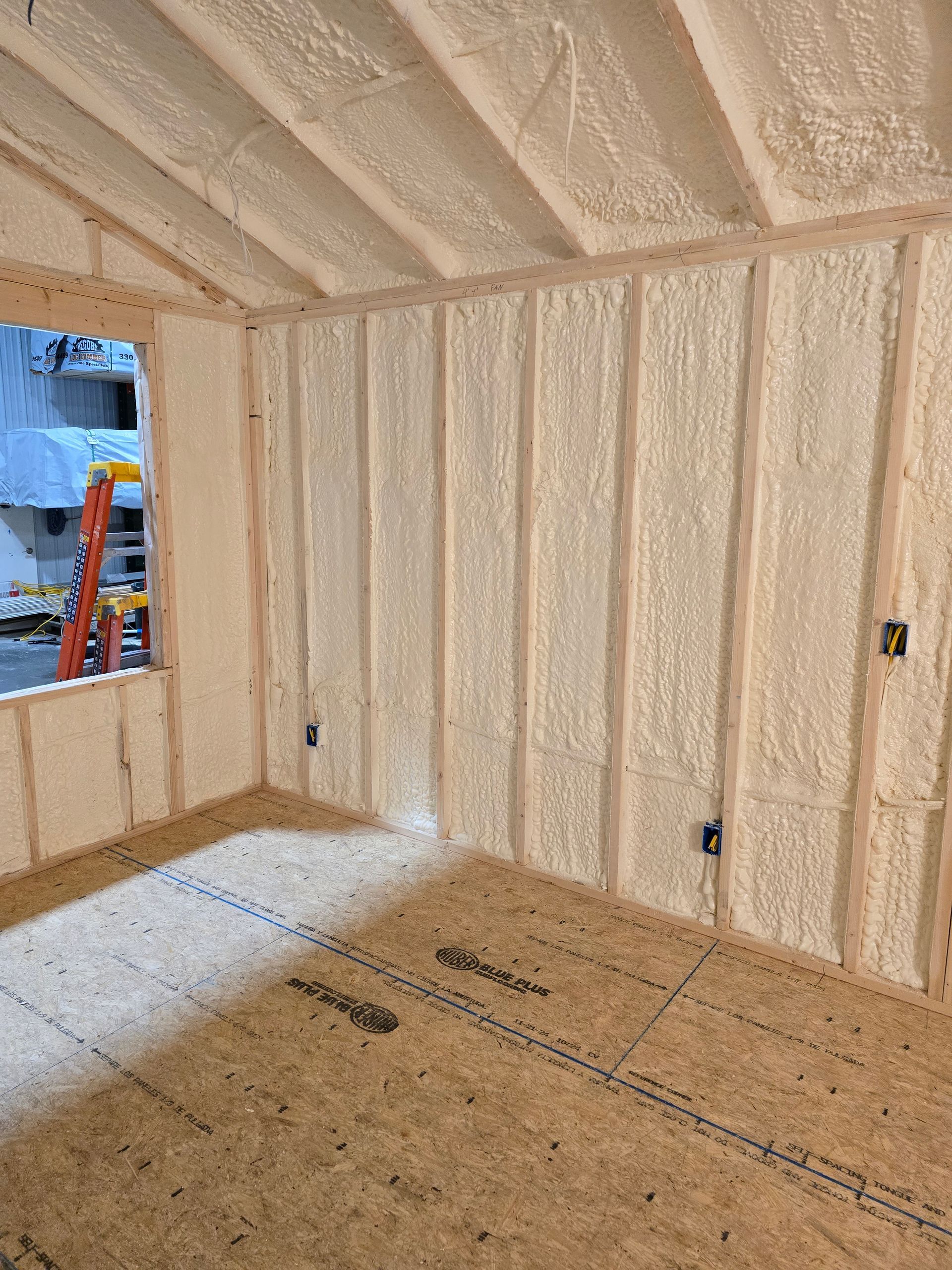 A room with a lot of insulation on the walls and ceiling.