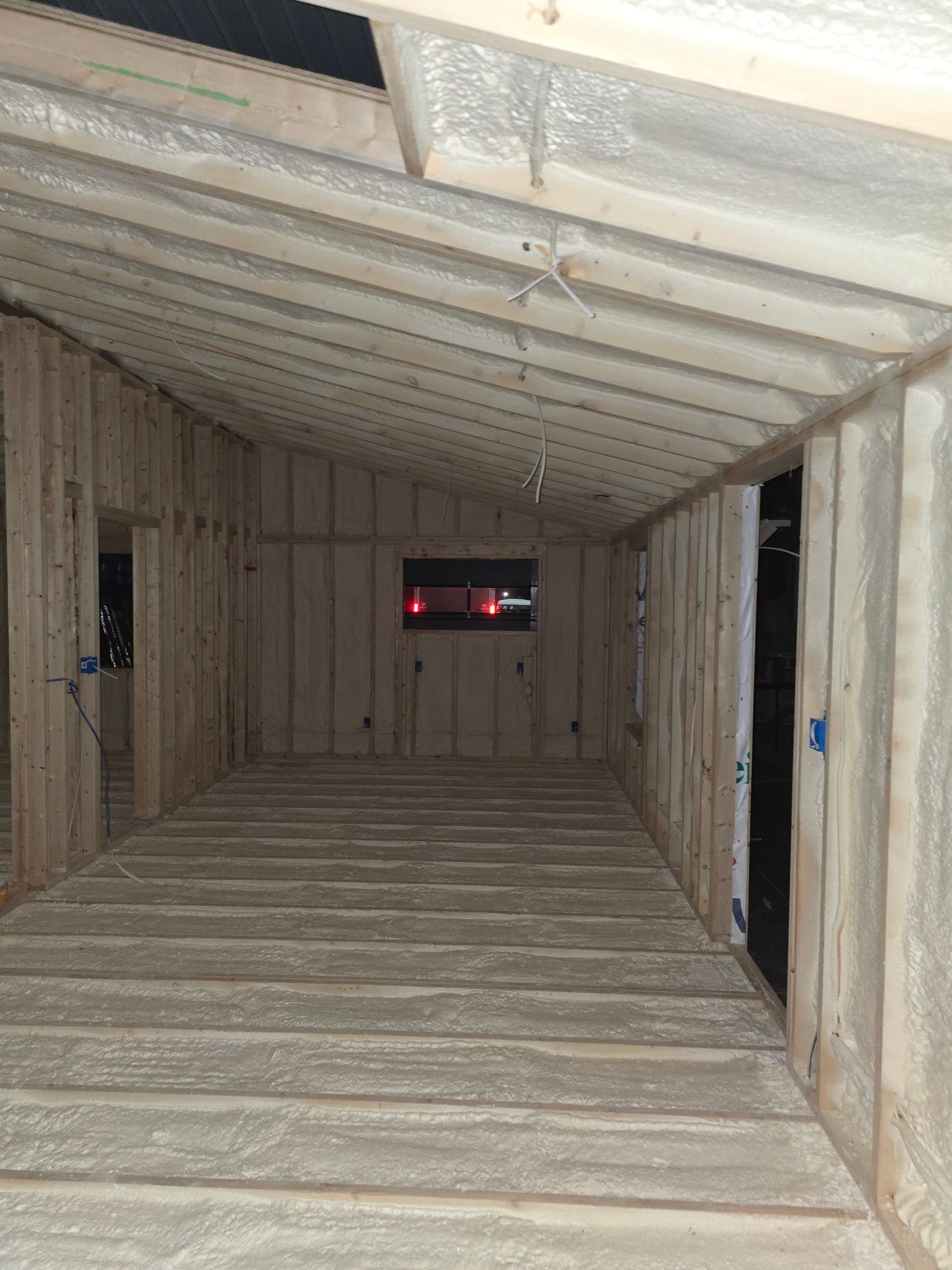 A room with a lot of wood and foam on the floor.